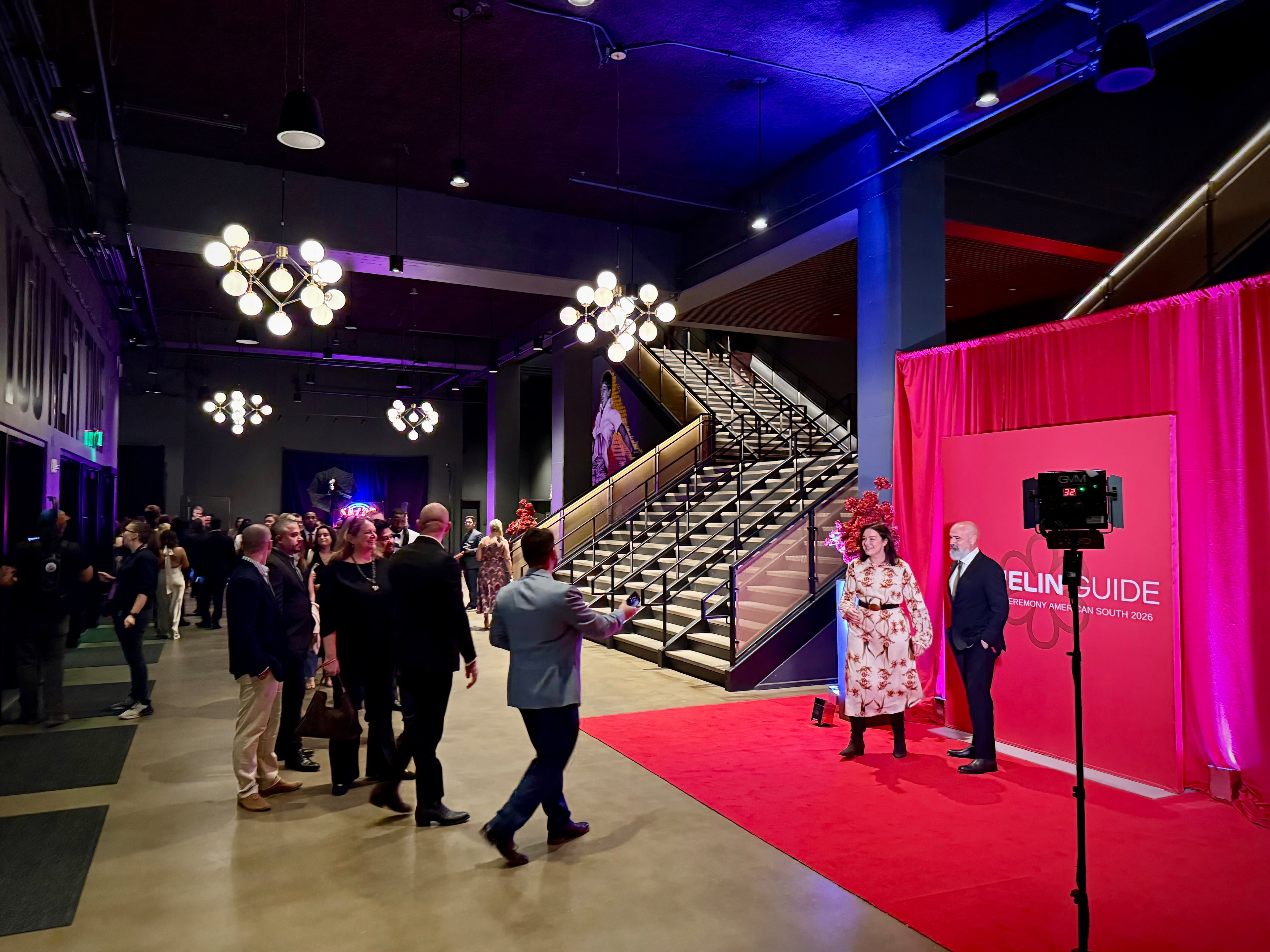Attendees line up to take photos and savor the moment at the 2026 Michelin Guide American South ceremony in Nashville. (Henri Hollis/AJC)