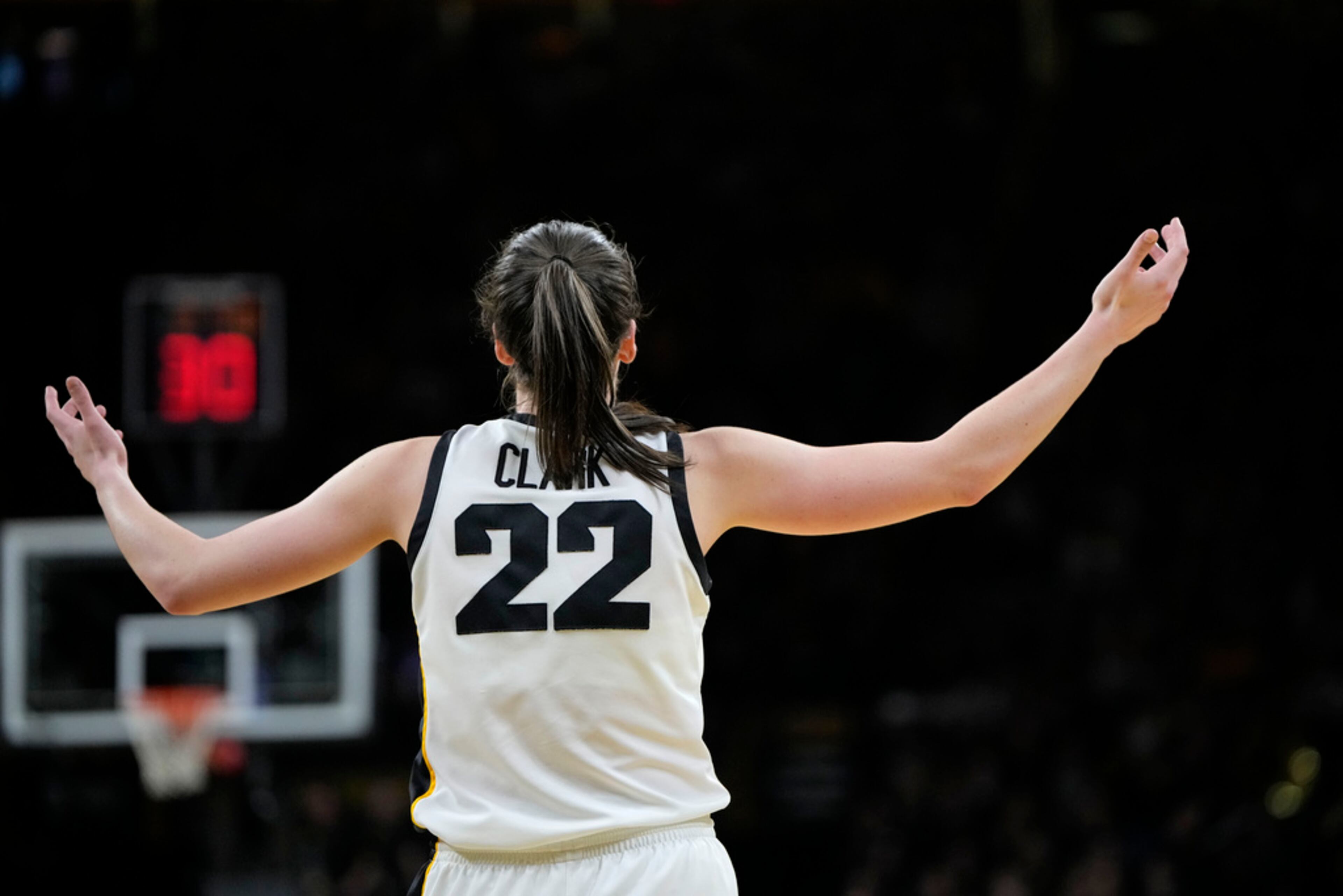 Iowa guard Caitlin Clark reacts after she thought she had been fouled by a Michigan player during the second half of an NCAA college basketball game Thursday, Feb. 15, 2024, in Iowa City, Iowa. (AP Photo/Matthew Putney)