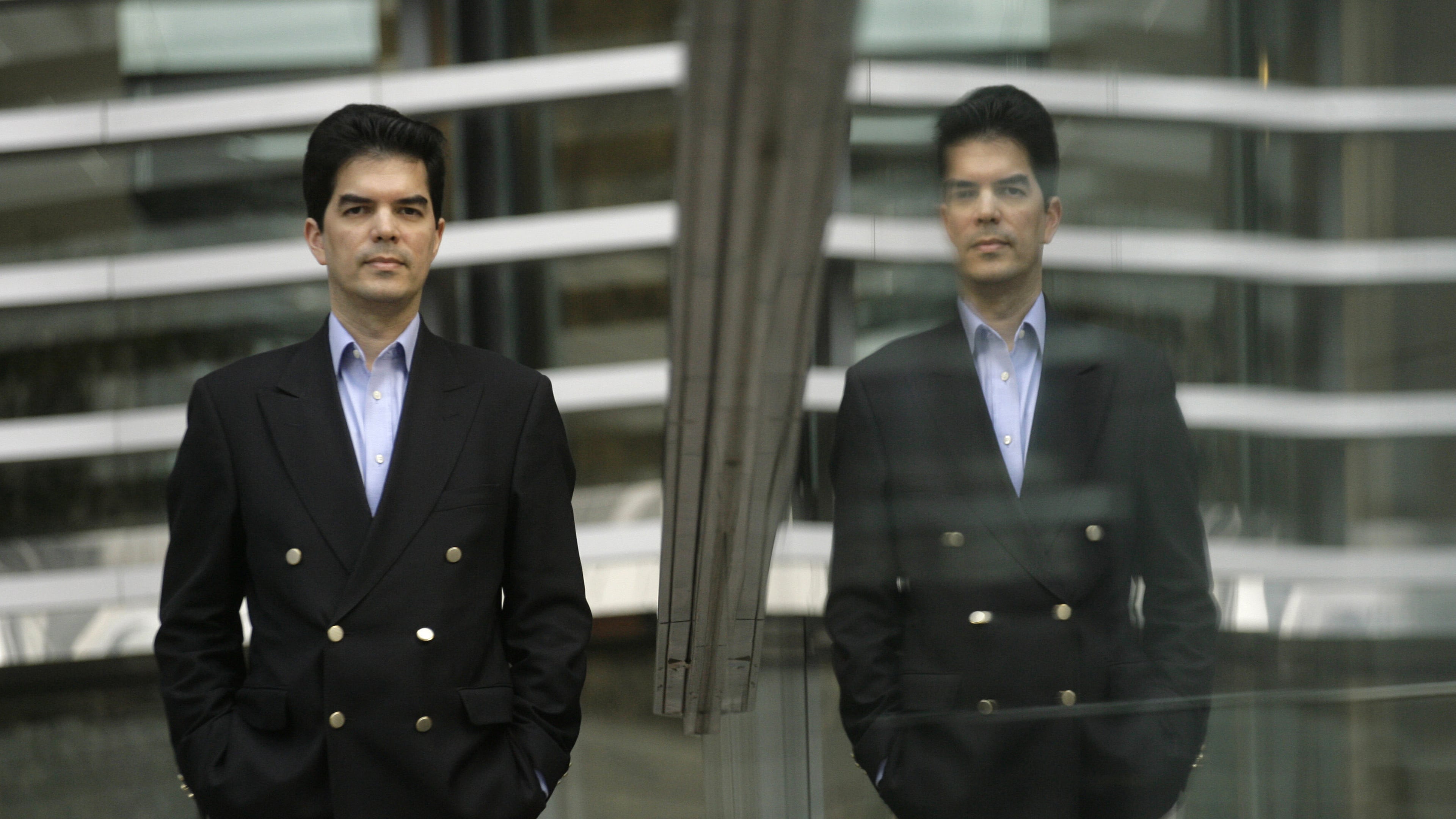 FILE - David Webb, a corporate governance activist poses for a photo after an interview with The Associated Press in Hong Kong, Tuesday, March 11, 2008. (AP Photo/Vincent Yu, File)