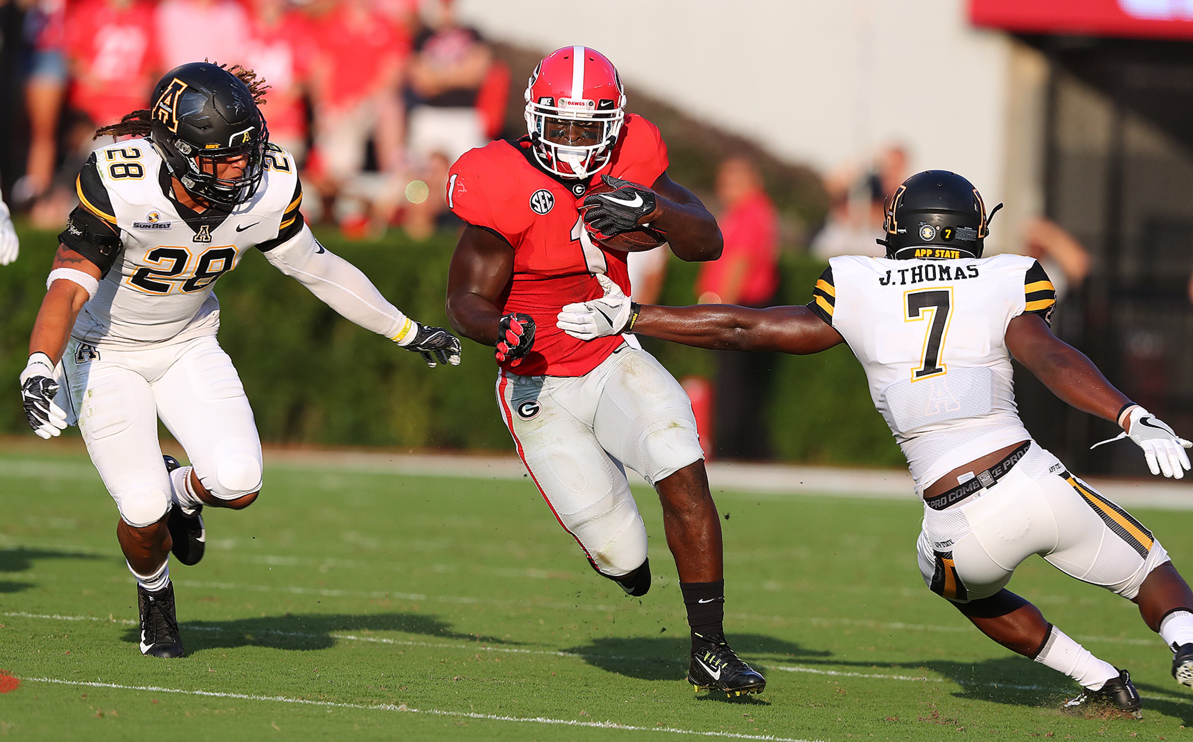 September 2, 2017 Athens: Georgia running back Sony Michel picks up a long gain during the first quarter against Appalachian State in a NCAA college football game on Saturday, September 2, 2017, in Athens. Curtis Compton/ccompton@ajc.com