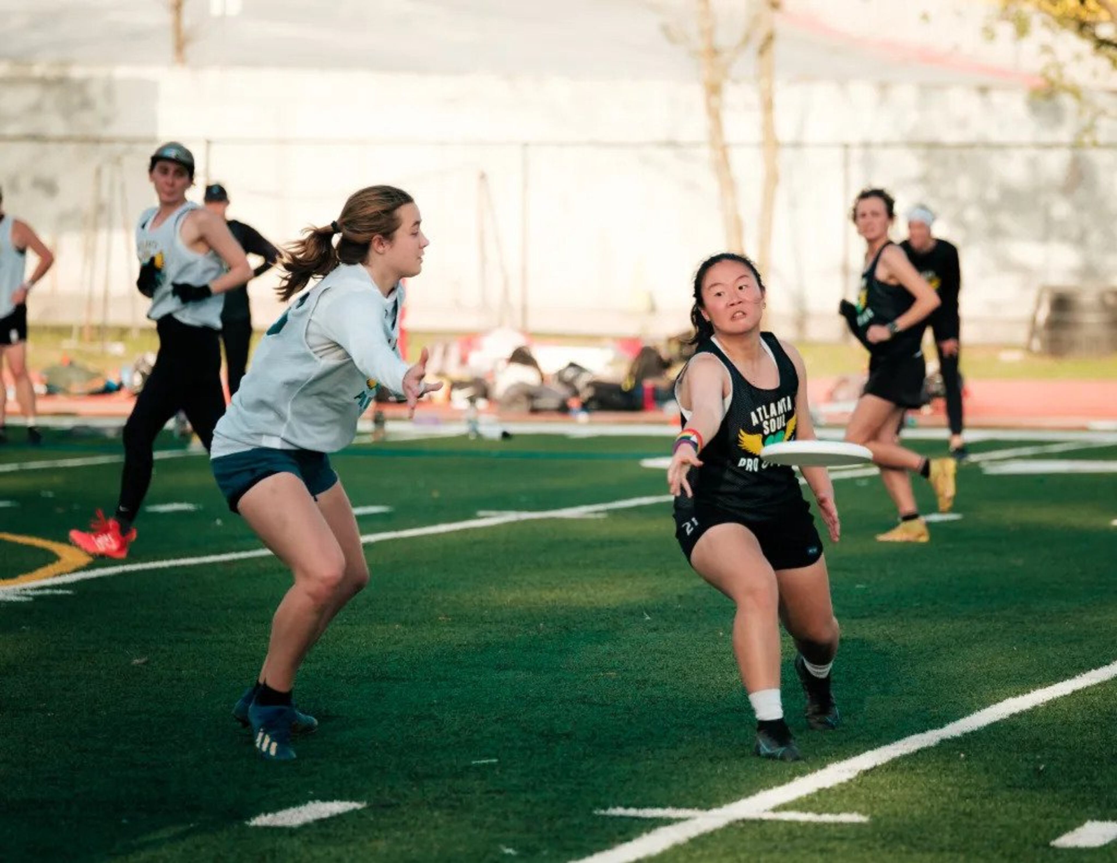 Sam Li handles the disc in an Atlanta Soul Pro Ultimate match.
