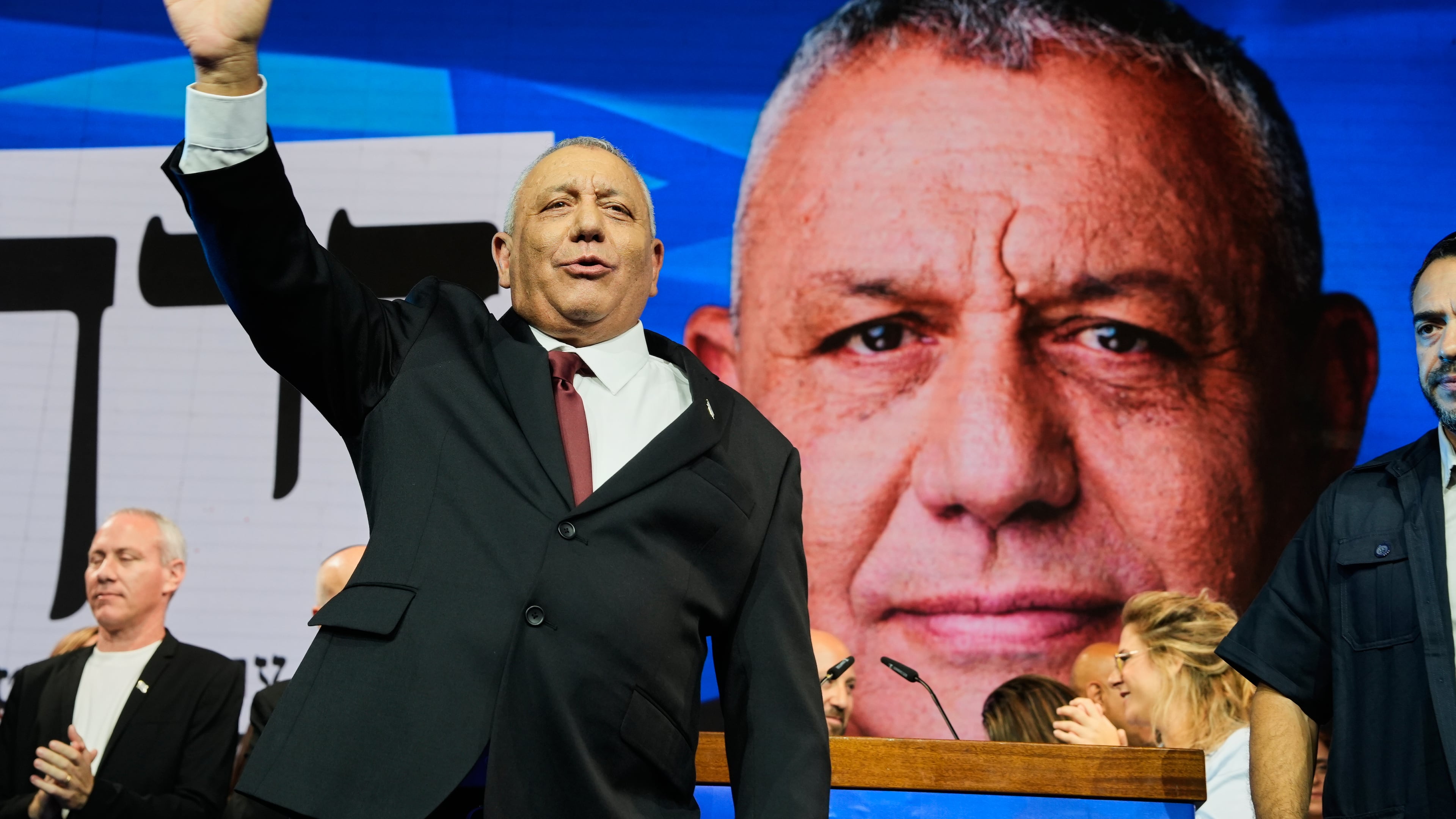 Gadi Eisenkot, leader of the Yashar ("Straight") party, waves to supporters following the release of the first exit poll results in Israel's general election in Tel Aviv, Israel, Wednesday, Oct. 28, 2026. (AP Photo/Baz Ratner)