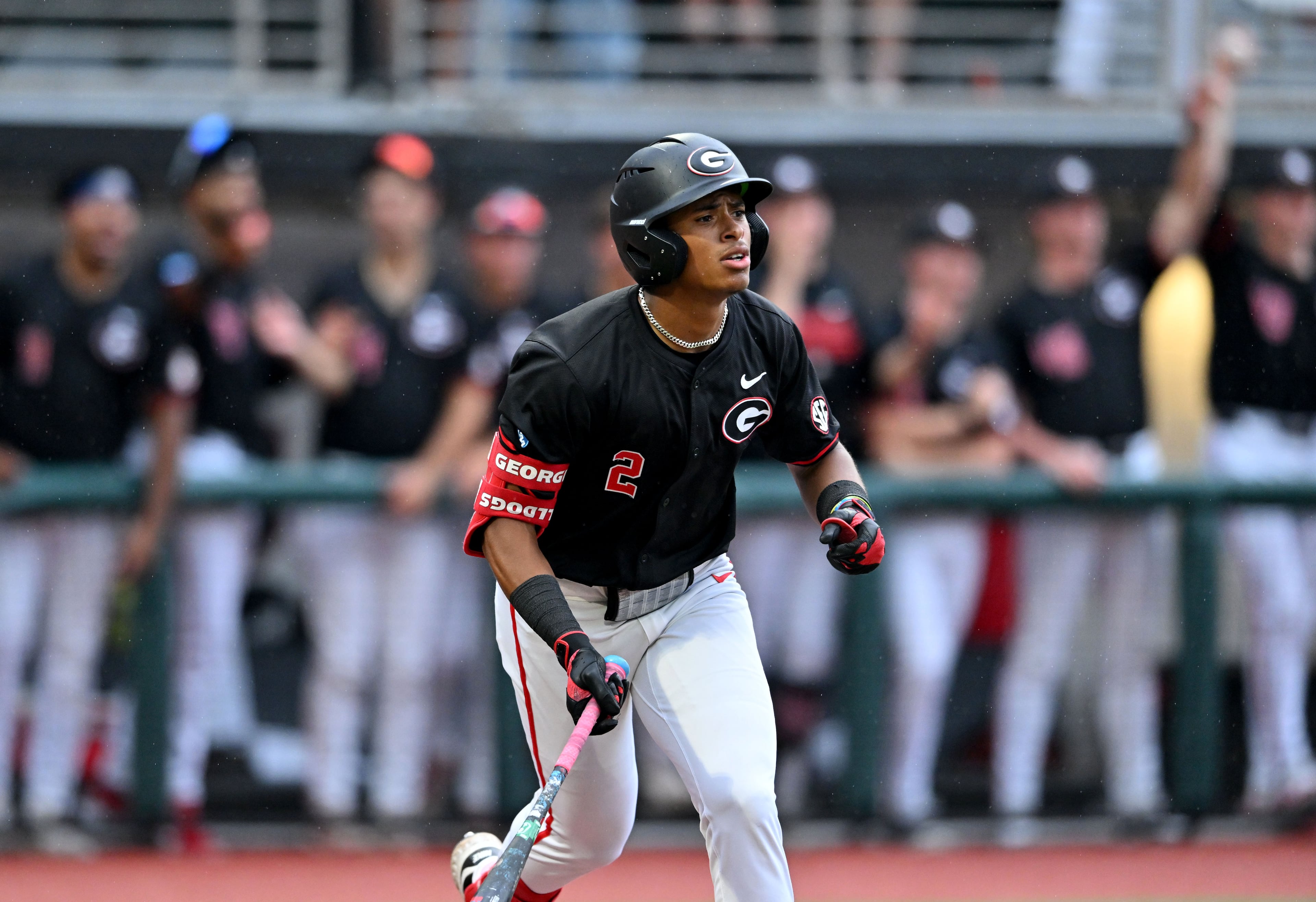 Georgia infielder Ryan Black (2) hits a solo home run during the fifth inning of their NCAA Regional game at Foley Field, Friday, May 29, 2026, in Athens. (Hyosub Shin/AJC)