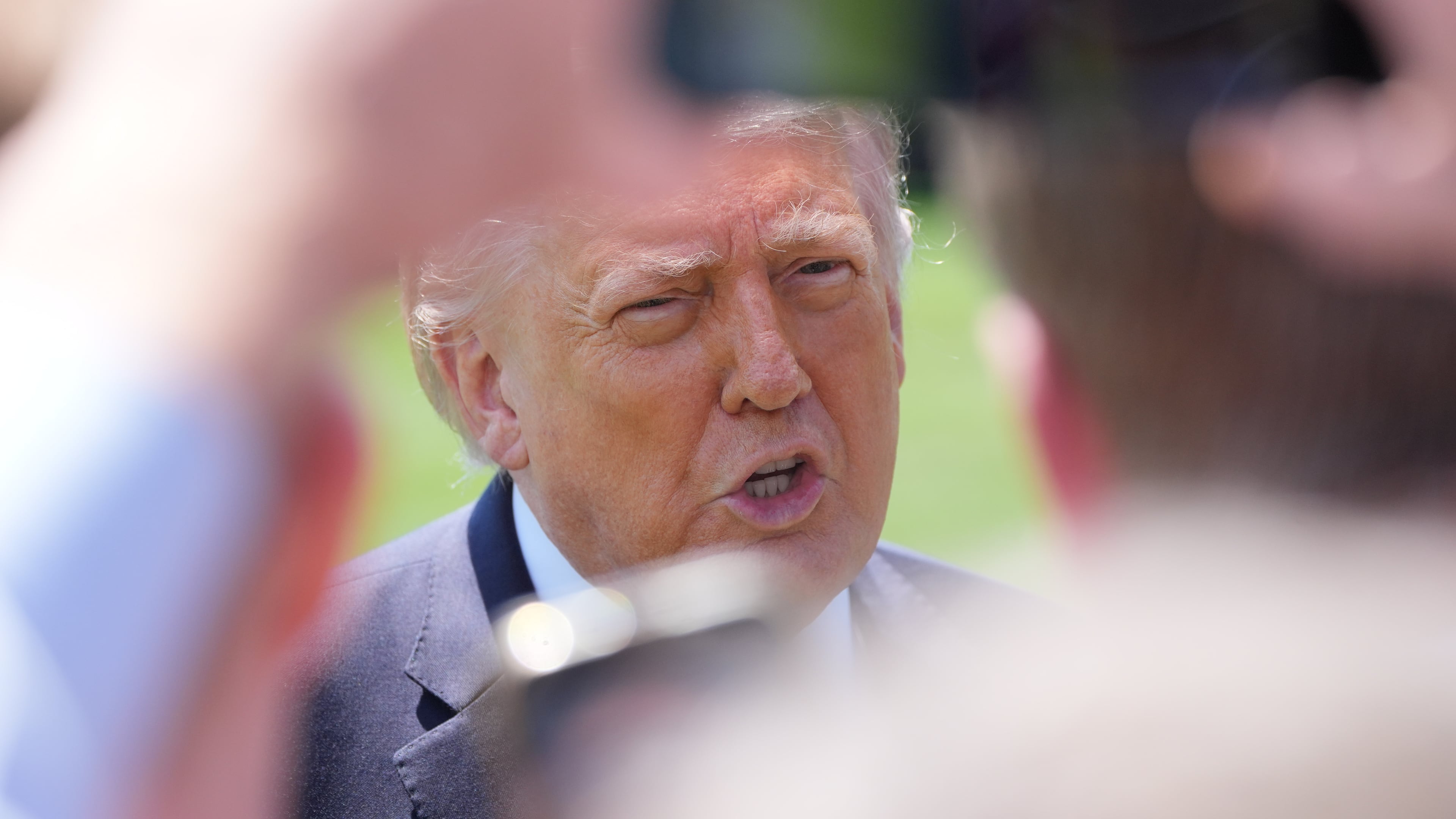 President Donald Trump speaks with reporters before departing on Marine One from the South Lawn of the White House, Friday, May 1, 2026, in Washington. (AP Photo/Alex Brandon)
