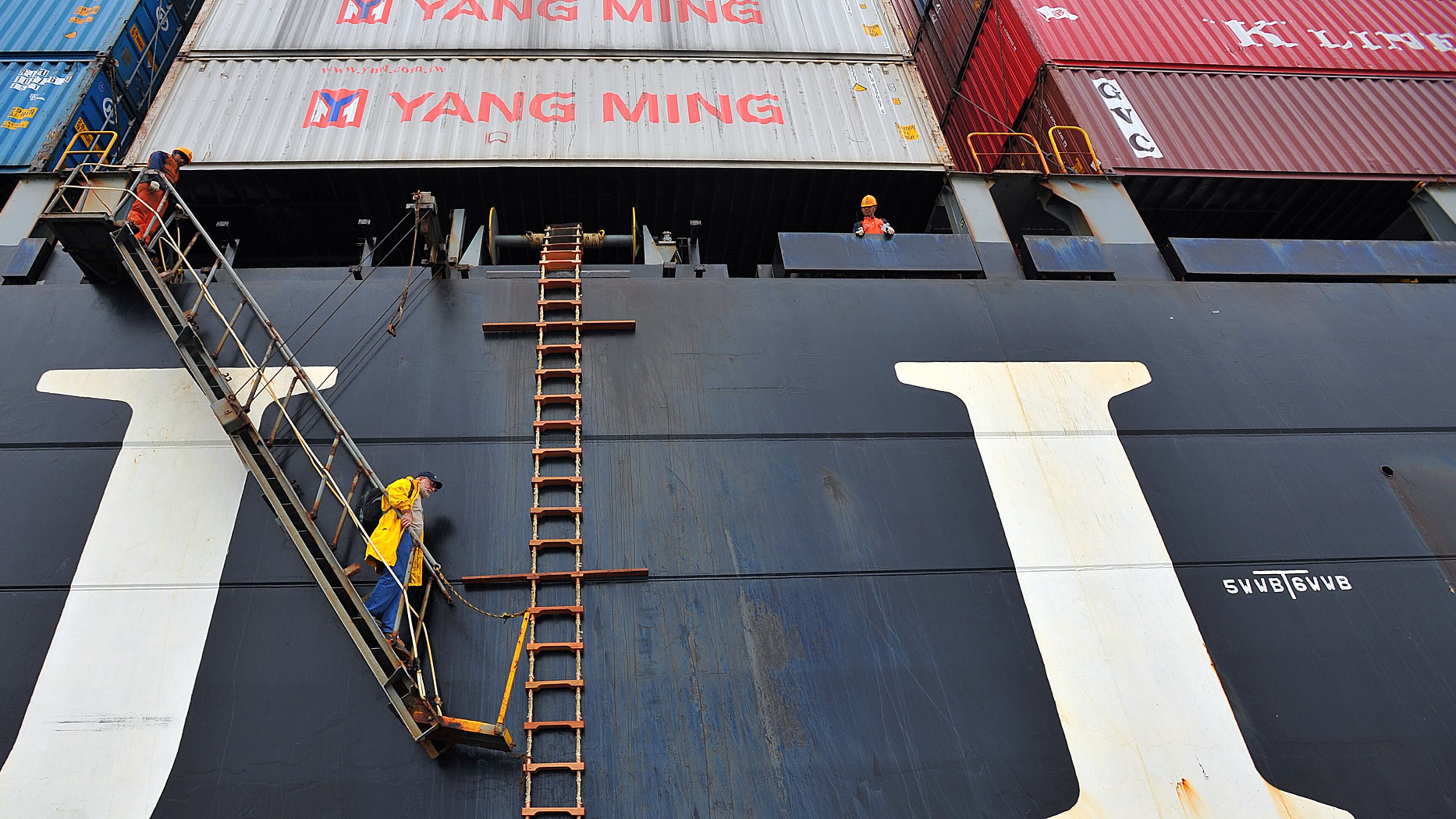 021512 Savannah, GA: River boat pilot Same Meyer climbs off a cargo ship after safely guiding it down the Savannah River Wednesday February 15, 2012. Local pilots board and deboard moving ships several times a day to guide the ships through Savannah River's narrow channel. . Brant Sanderlin bsanderlin@ajc.com