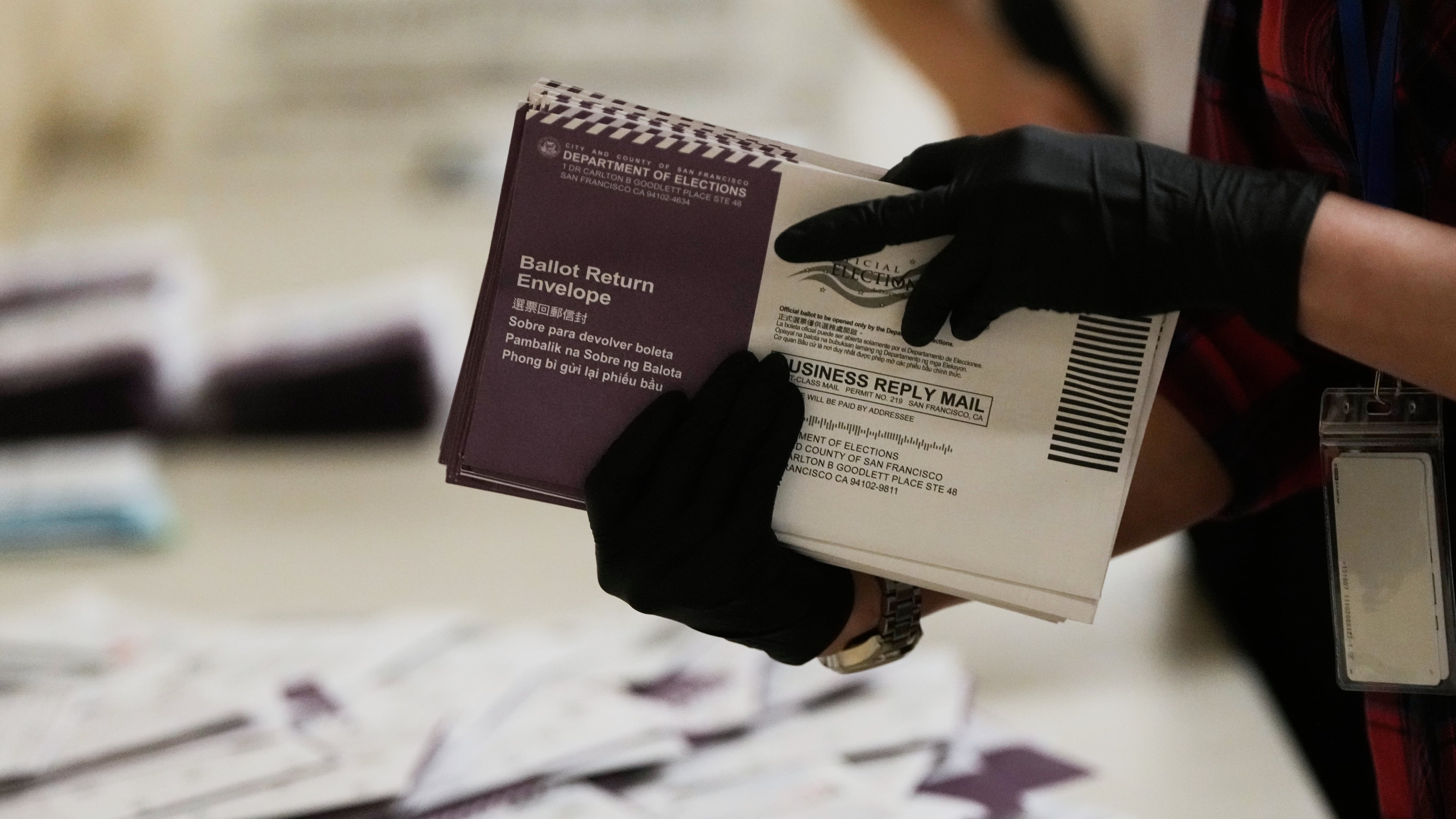 Department of Elections workers sort mail-in ballots for the California primary election at City Hall on Tuesday, June 2, 2026, in San Francisco. (AP Photo/Jeff Chiu)