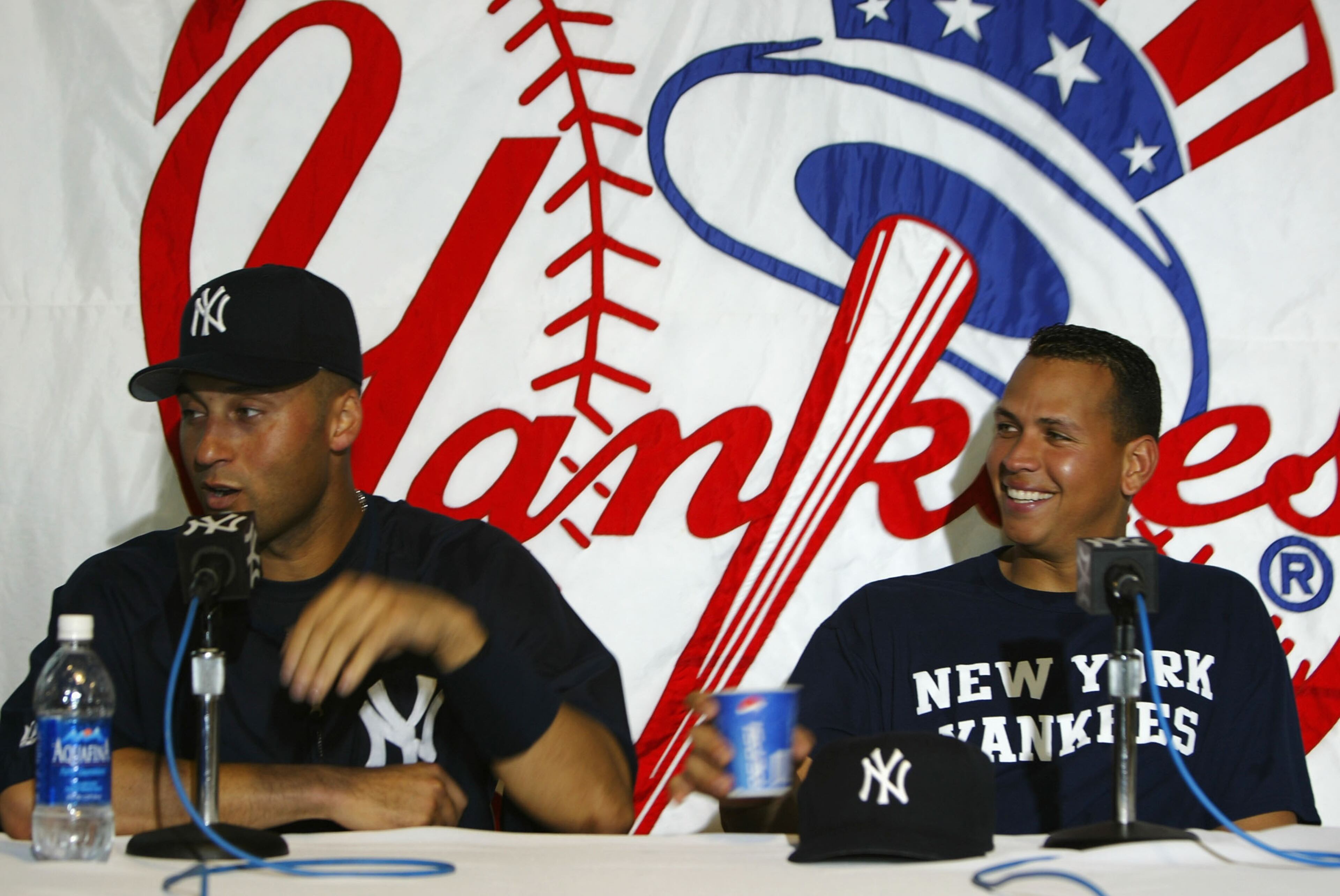 2004:Alex Rodriguez #13 and Derek Jeter #2 of the New York Yankees during a press conference after practice on February 24, 2004 at the Yankees spring training complex in Tampa, Florida. (Photo by Ezra Shaw/Getty Images)