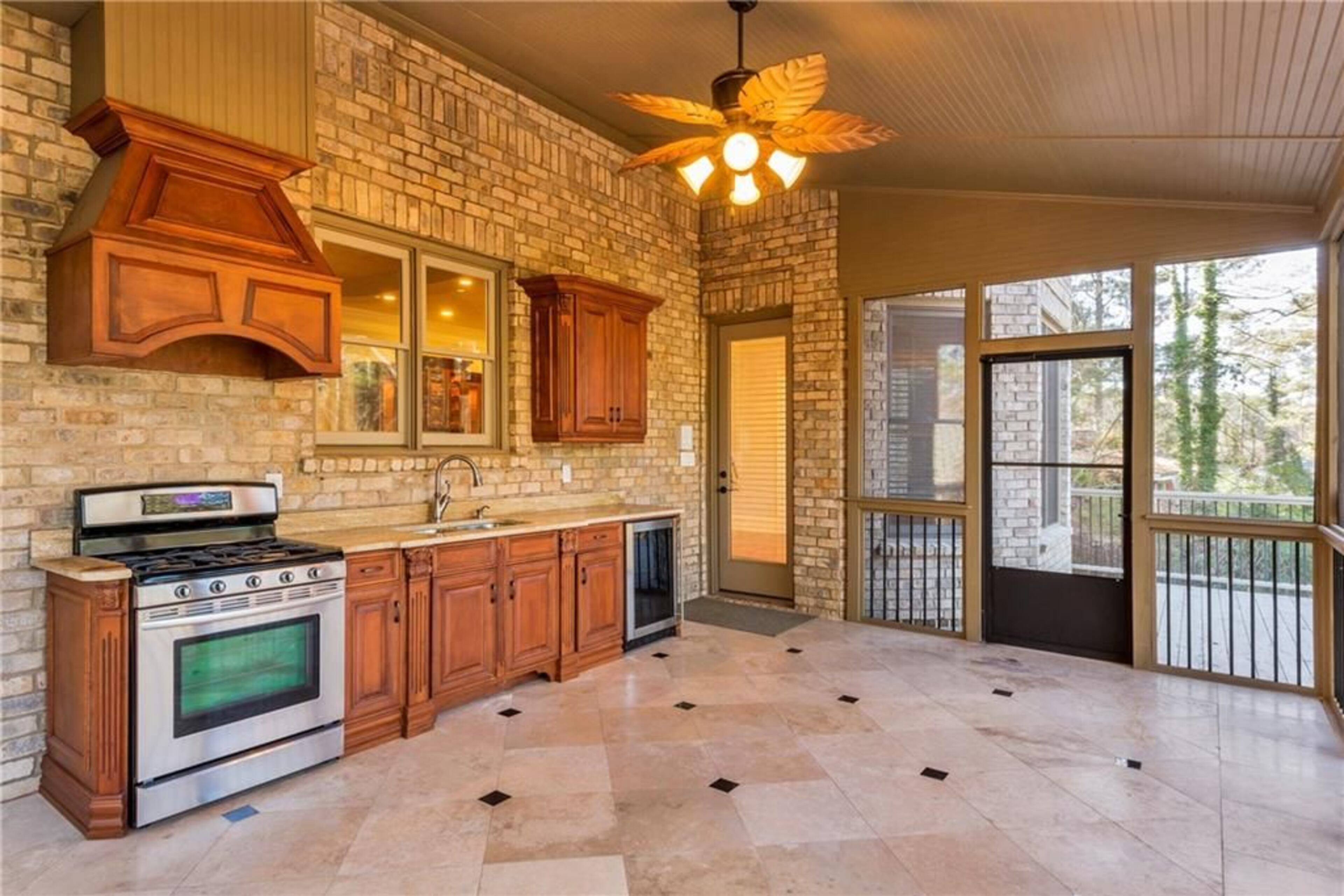Entertaining outside? The home comes with an outside kitchen.