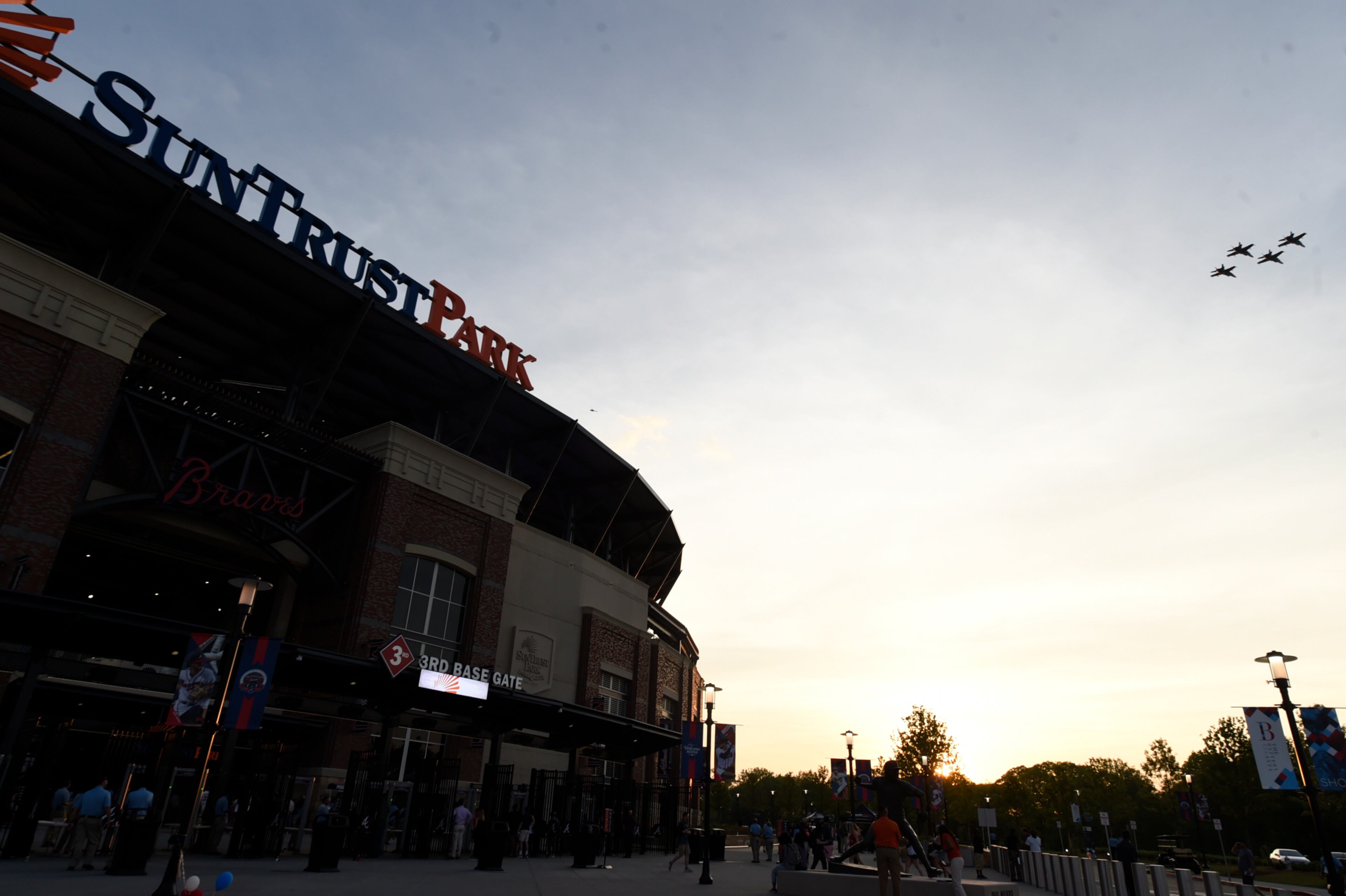 The exterior of the new stadium while United States Navy F/A-18A+ Hornets from VFC-12 out of Oceana, Va., perform a flyover.