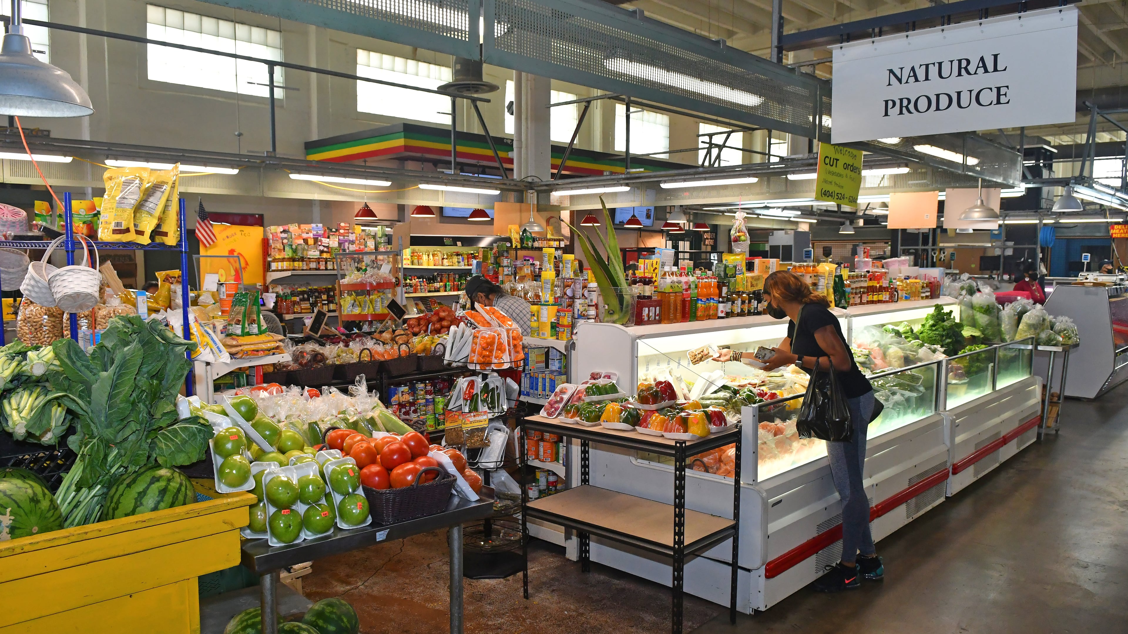 Shoppers chose from a wide variety of meats, seafood and produce at the Municipal Market. (CHRIS HUNT FOR THE ATLANTA JOURNAL-CONSTITUTION)
