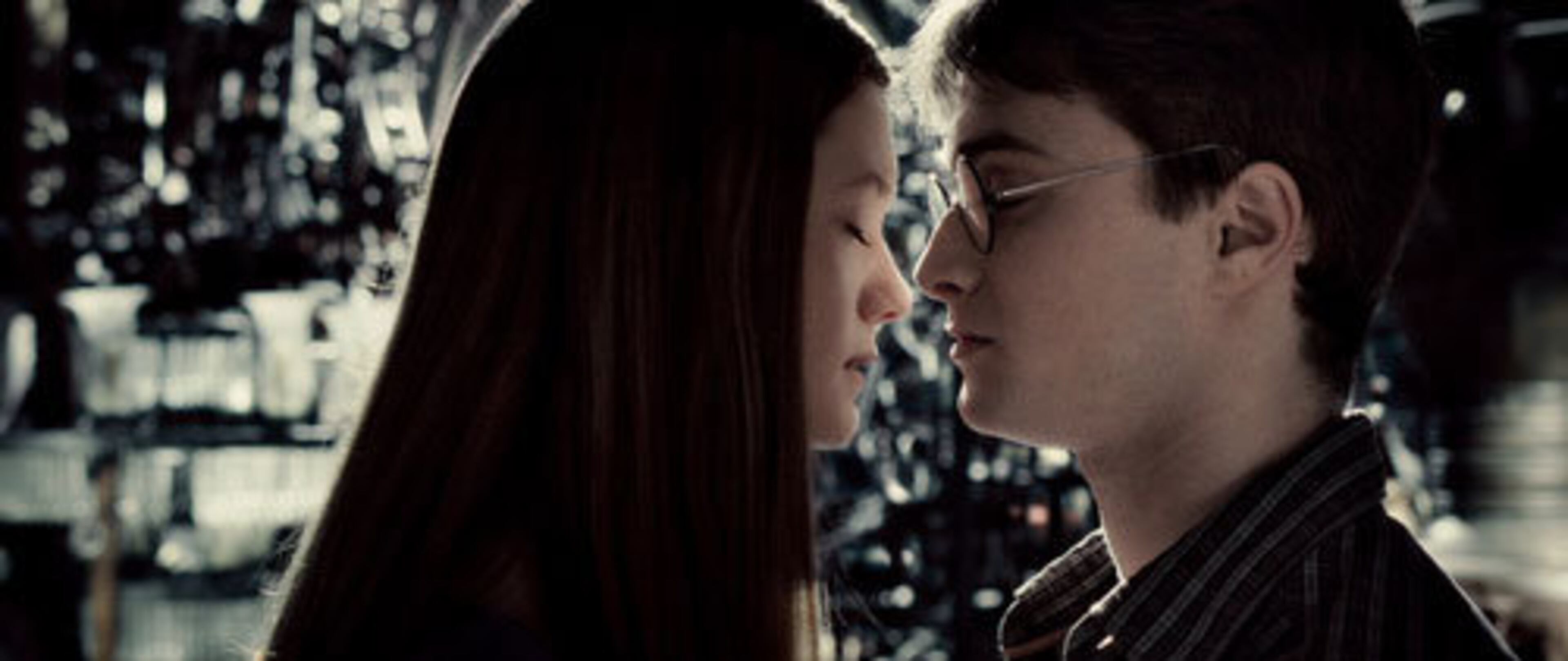 NOW: Wright is now 20 years old, and it looks as though her character, Ginny, has done some major growing up too, seen here in an intimate moment with Harry.