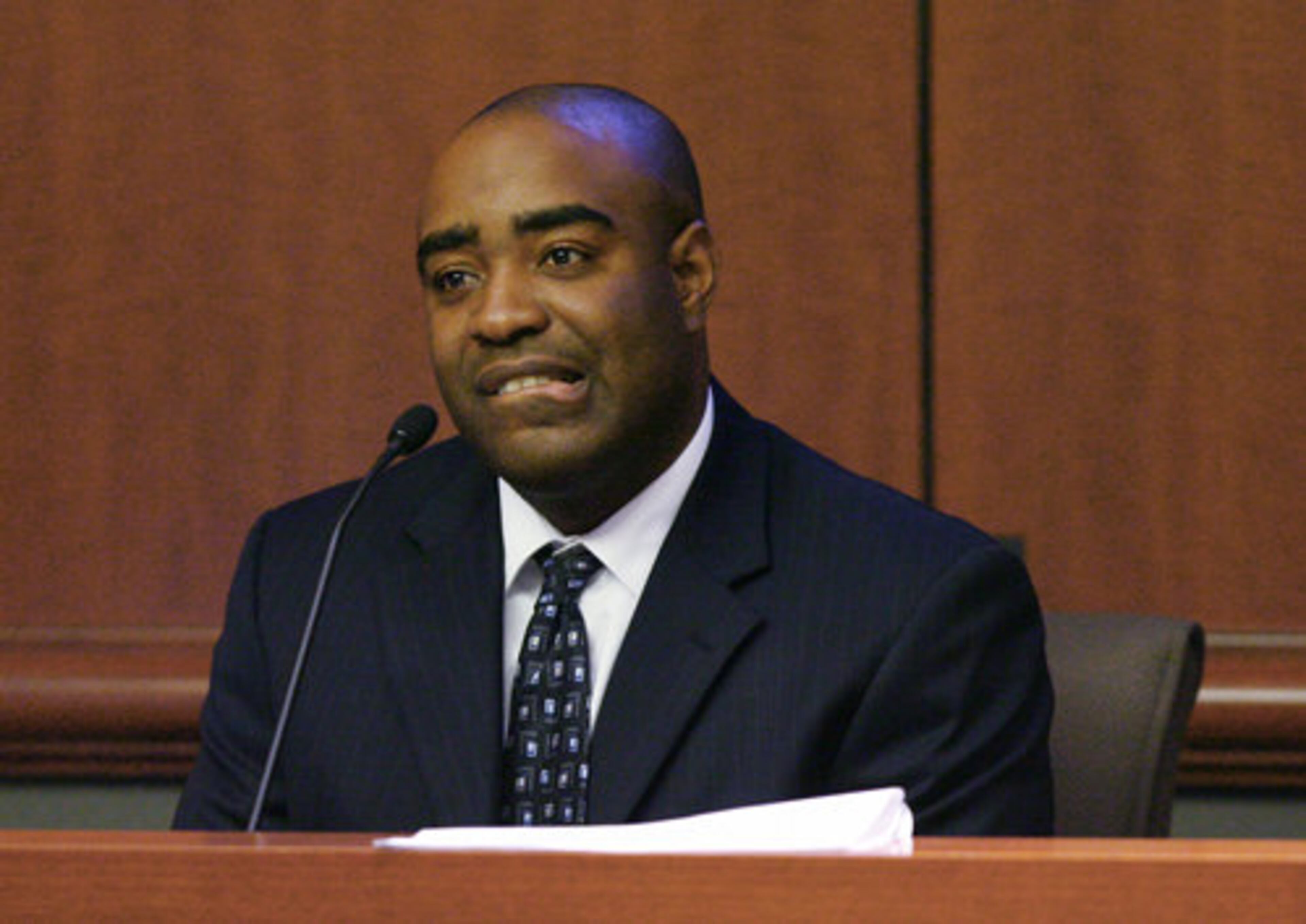 Terrence Tyson bites his lip during a confrontational interrogation by prosecution attorneys.