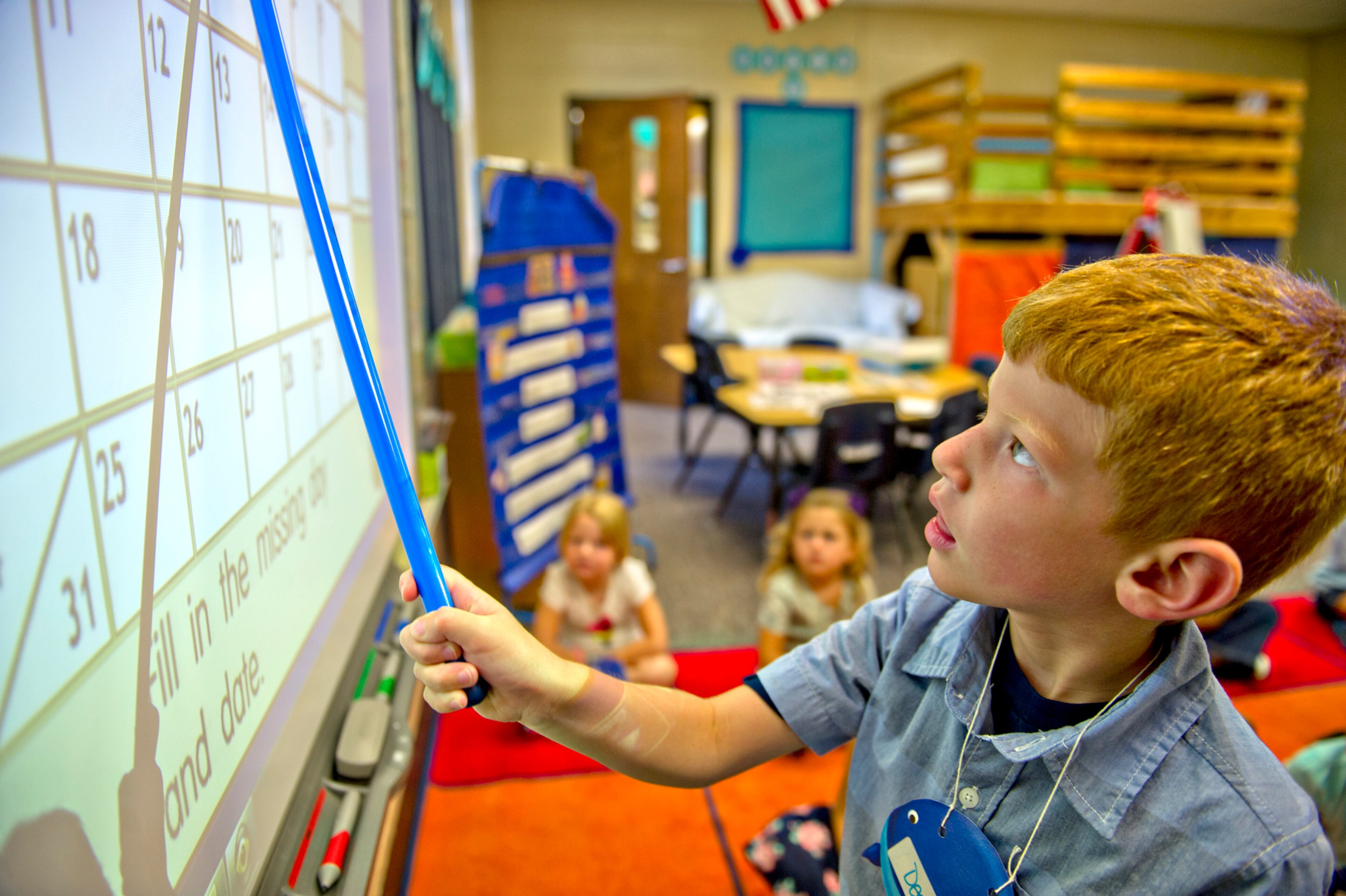 Deacon Pederson uses a smart board during the first day of classes at Davis Elementary School in Marietta on Monday, August 4, 2014. Teachers and administrators at the school dressed as pirates for the first day of school. Students in Cobb County and Atlanta public schools headed back to class on Monday for the new school year. JONATHAN PHILLIPS / SPECIAL
