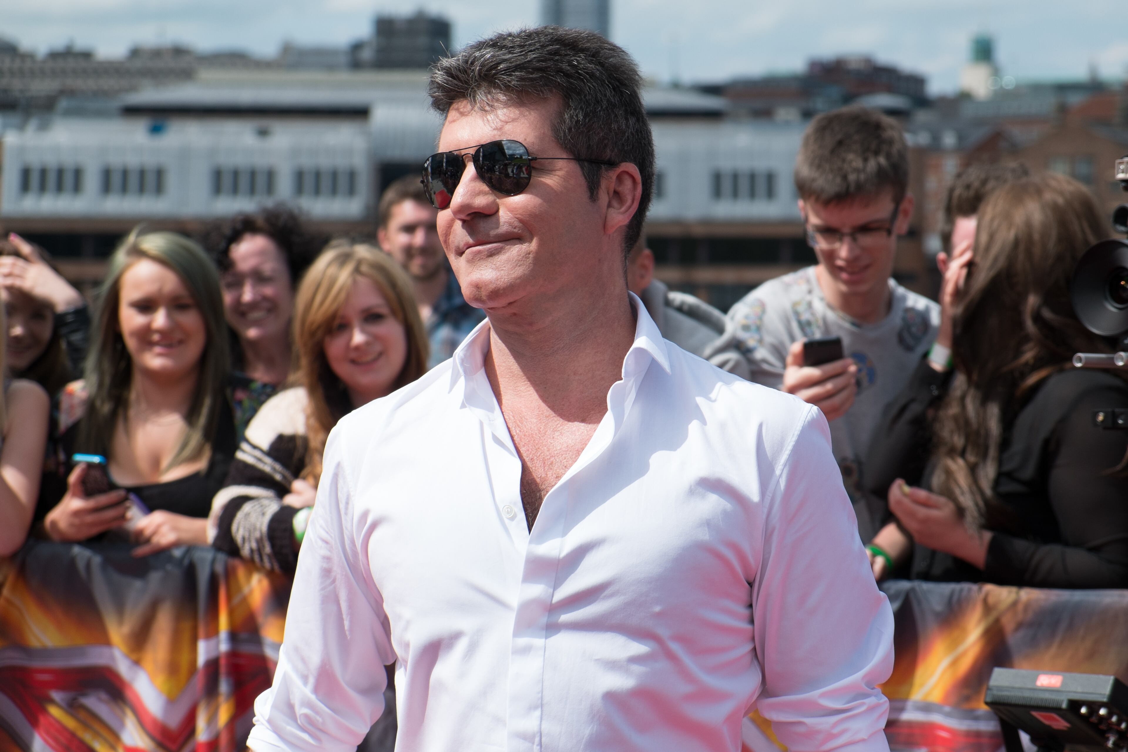 NEWCASTLE UPON TYNE, UNITED KINGDOM - JUNE 26: Simon Cowell arrives for the Newcastle Auditions of X Factor at Newcastle Gateshead Quayside on June 26, 2014 in Newcastle upon Tyne, England. (Photo by Tommy Jackson/Getty Images)