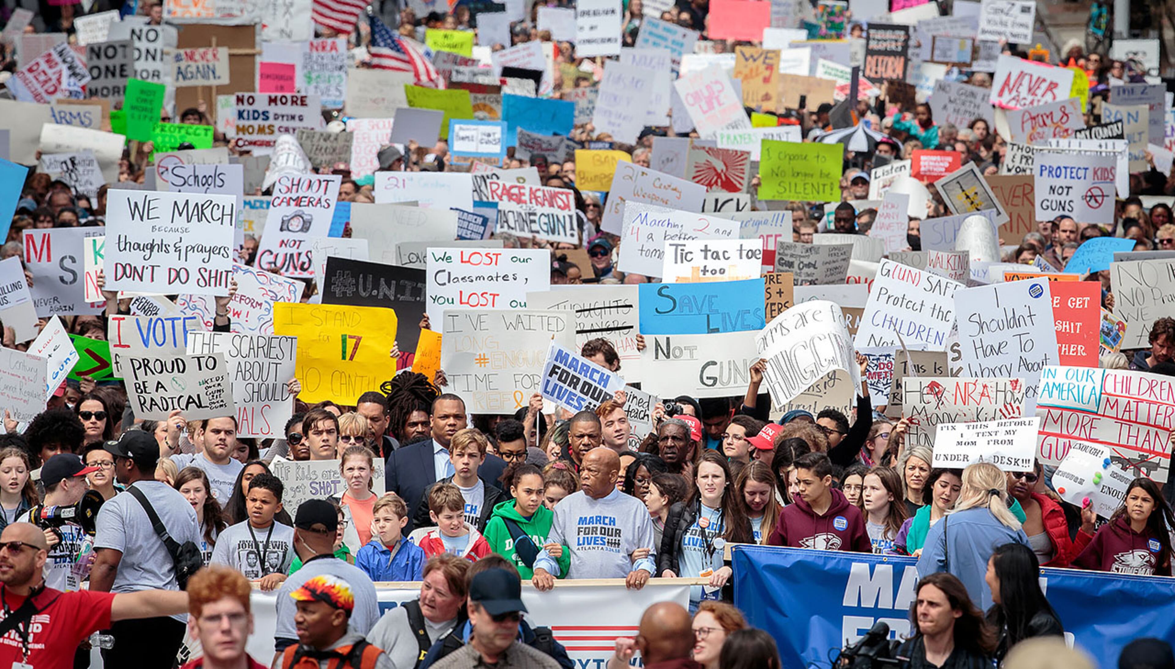 Congressman John Lewis (C) and student organizers head for Liberty Plaza, near the State Capitol during March For Our Life Atlanta rally Saturday, March 24, 2018. The Atlanta police department estimated the crowd at near 30,000 people. STEVE SCHAEFER / SPECIAL TO THE AJC