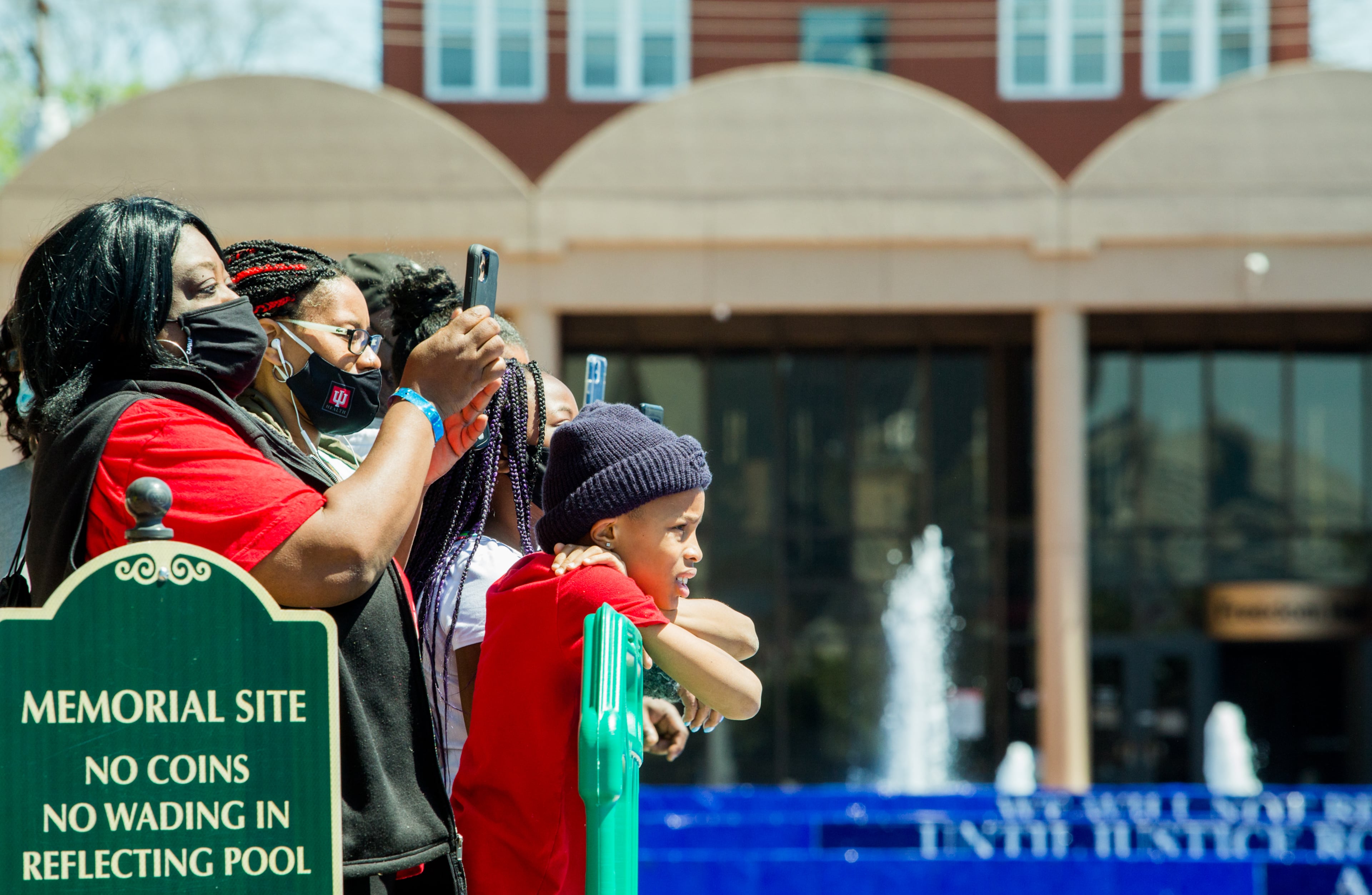 Ronnie Zackery, 10, from Illinois watches the Rev. Martin Luther King Jr.'s family during a wreath-laying ceremony at the King Center on the 53rd anniversary of the assassination of the civil rights icon on April 4, 2021. (Photo: Jenni Girtman for The Atlanta Journal-Constitution)