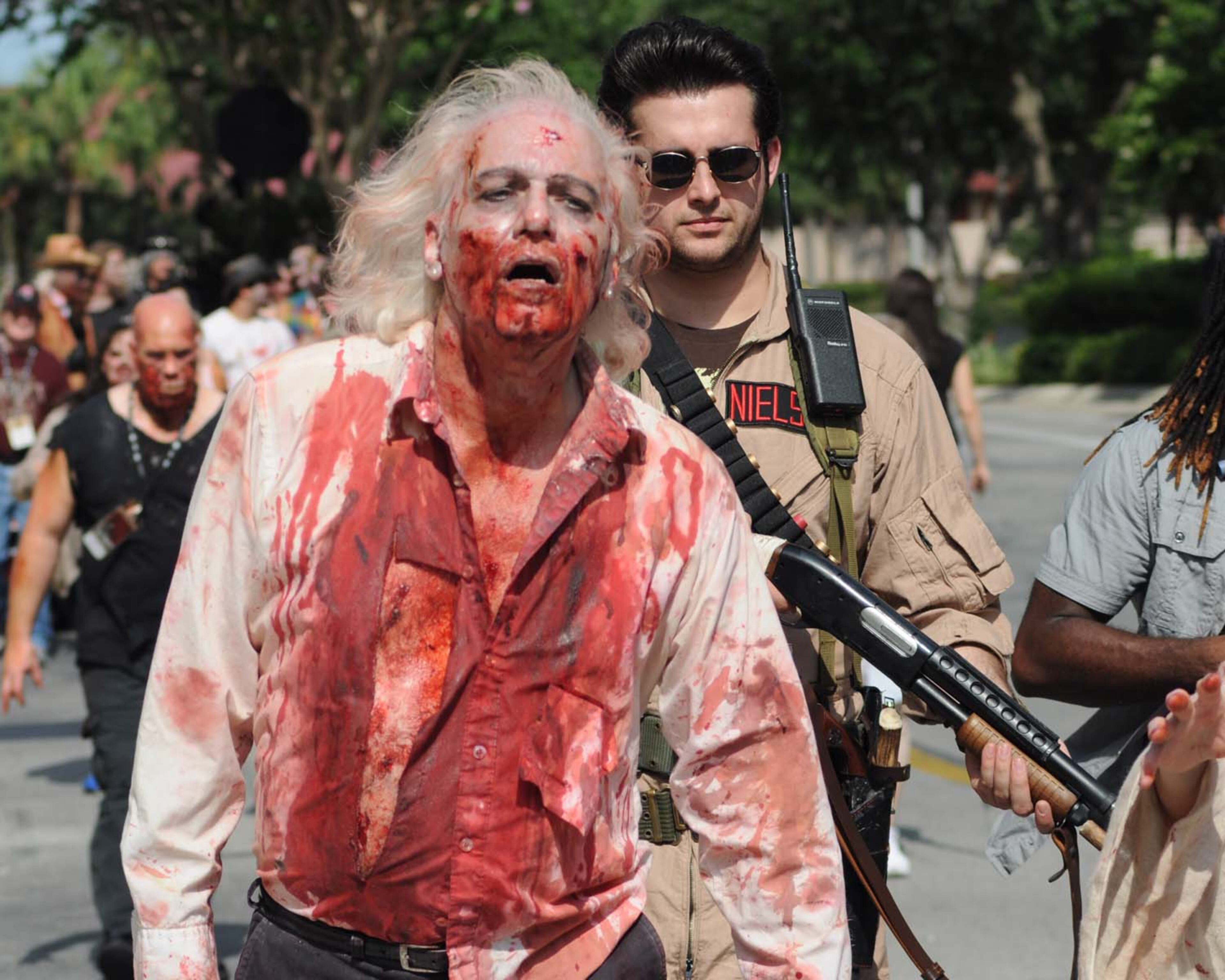 A pack of blood-thirsty zombies marched on the Rosen Centre Hotel in Orlando, Florida to kick off Spooky Empire's annual May-Hem horror convention.