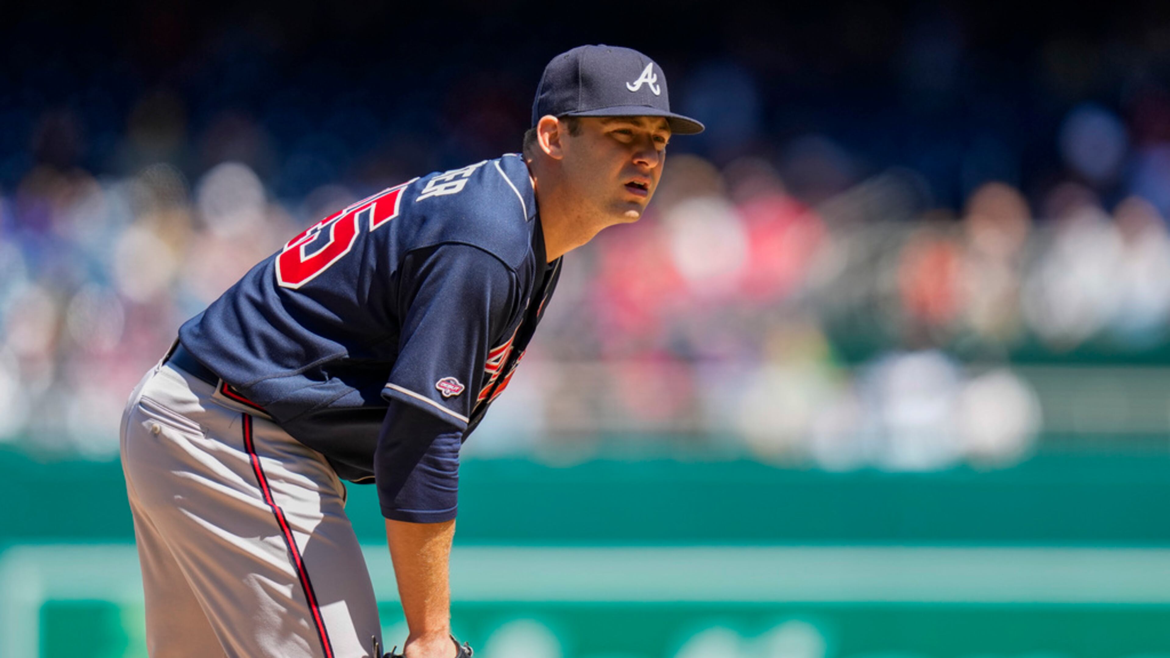 Atlanta Braves starting pitcher Jared Shuster prepares to pitch during the first inning of a baseball game against the Washington Nationals at Nationals Park, Sunday, April 2, 2023, in Washington. (AP Photo/Alex Brandon)