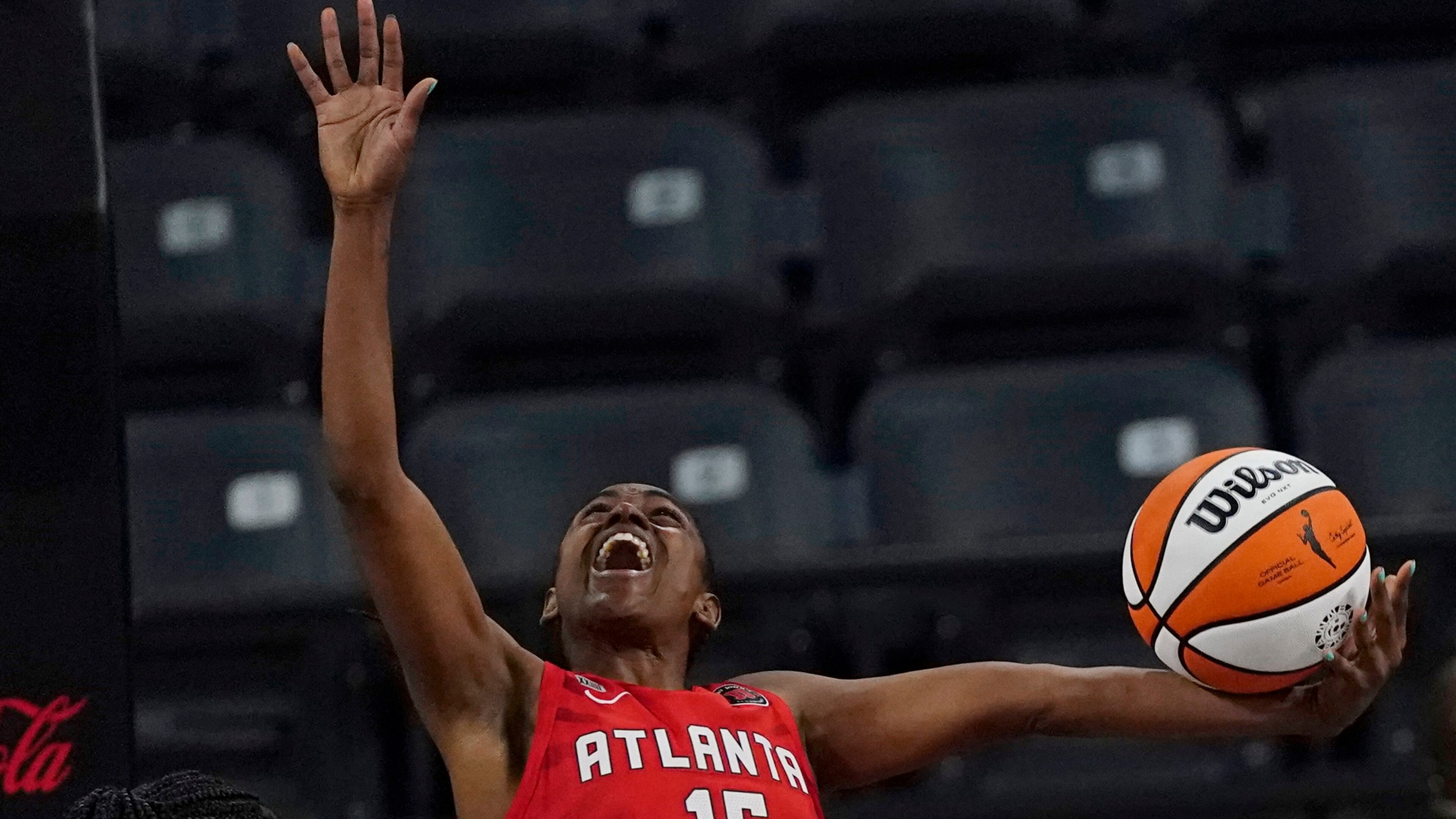 Atlanta Dream guard Tiffany Hayes (15) shoots against the Seattle Storm. (AP Photo/John Bazemore)