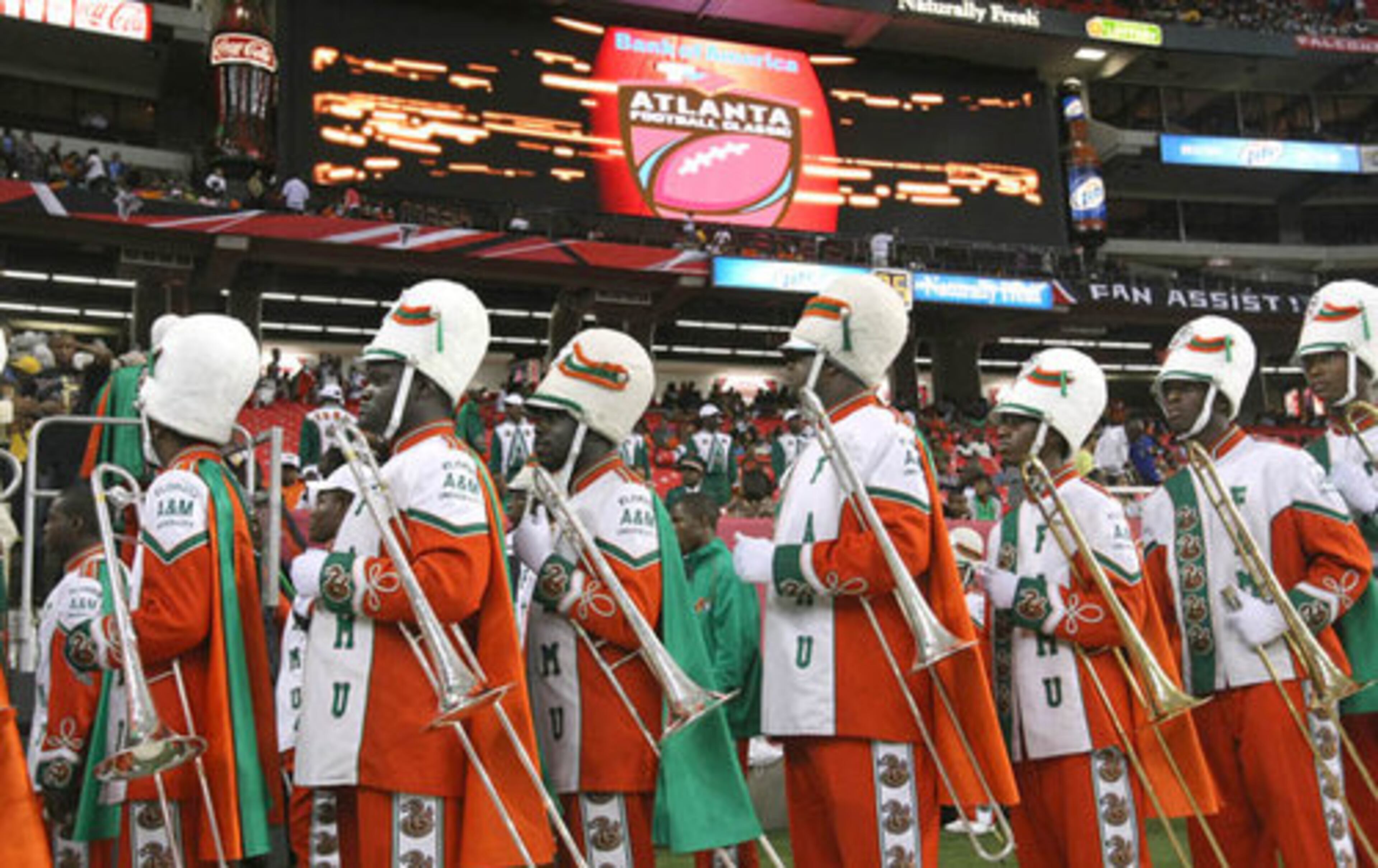 Florida A&M's Marching 100 take the field for the halftime battle of the bands at the 2009 Atlanta Classic at the Georgia Dome Saturday between the Florida A&M Rattlers and the Tennessee State Tigers.