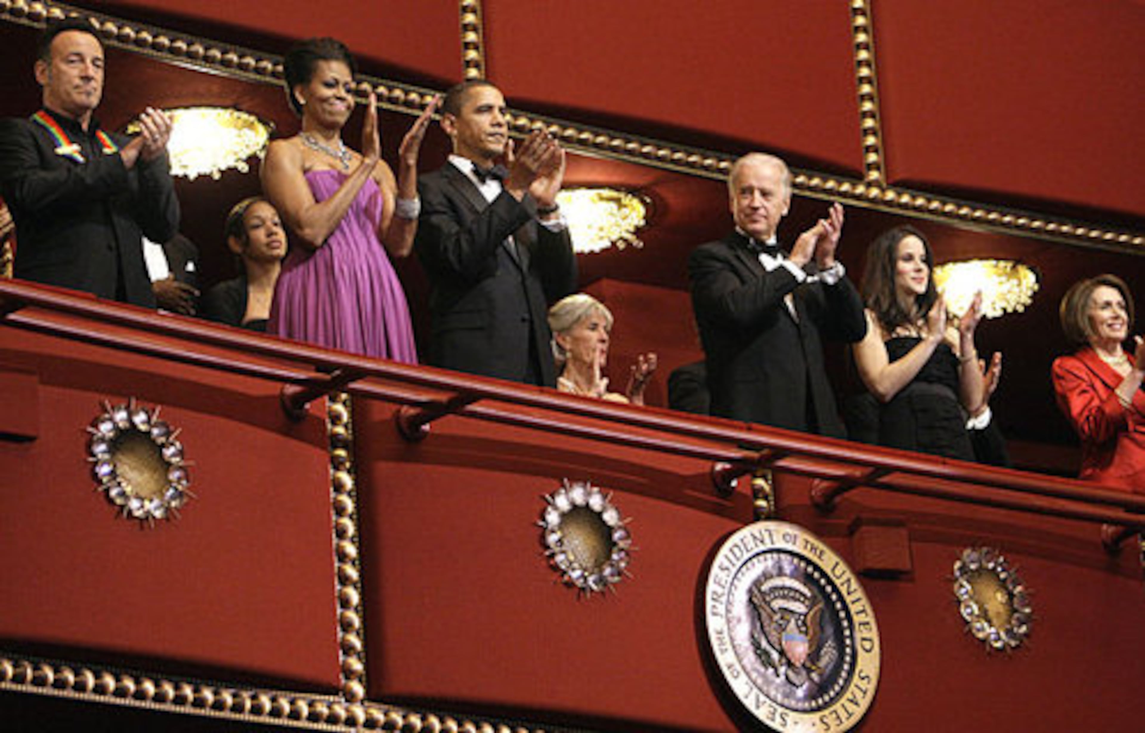 Bruce Springsteen, left, first lady Michelle Obama, President Barack Obama, vice president Joe Biden, his daughter Ashley Biden, and House Speaker Nancy Pelosi applaud at the Kennedy Center Honors gala.