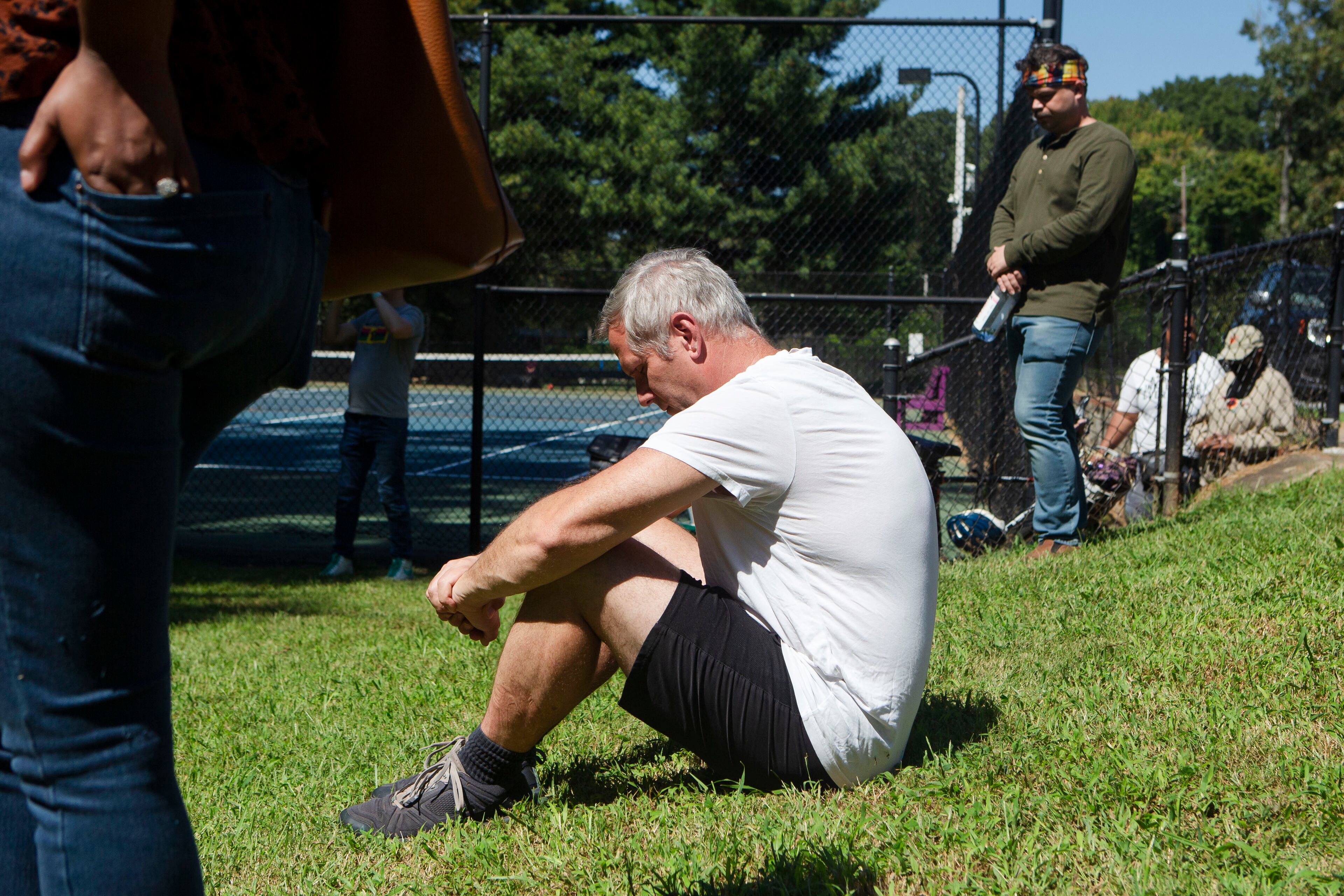 A man takes a moment of silence during the dedication of a historical marker for Zeb Long, a lynching victim from the 1906 Atlanta Race Massacre, on Saturday, September 24, 2022, at Sumner Park in East Point. CHRISTINA MATACOTTA FOR THE ATLANTA JOURNAL-CONSTITUTION