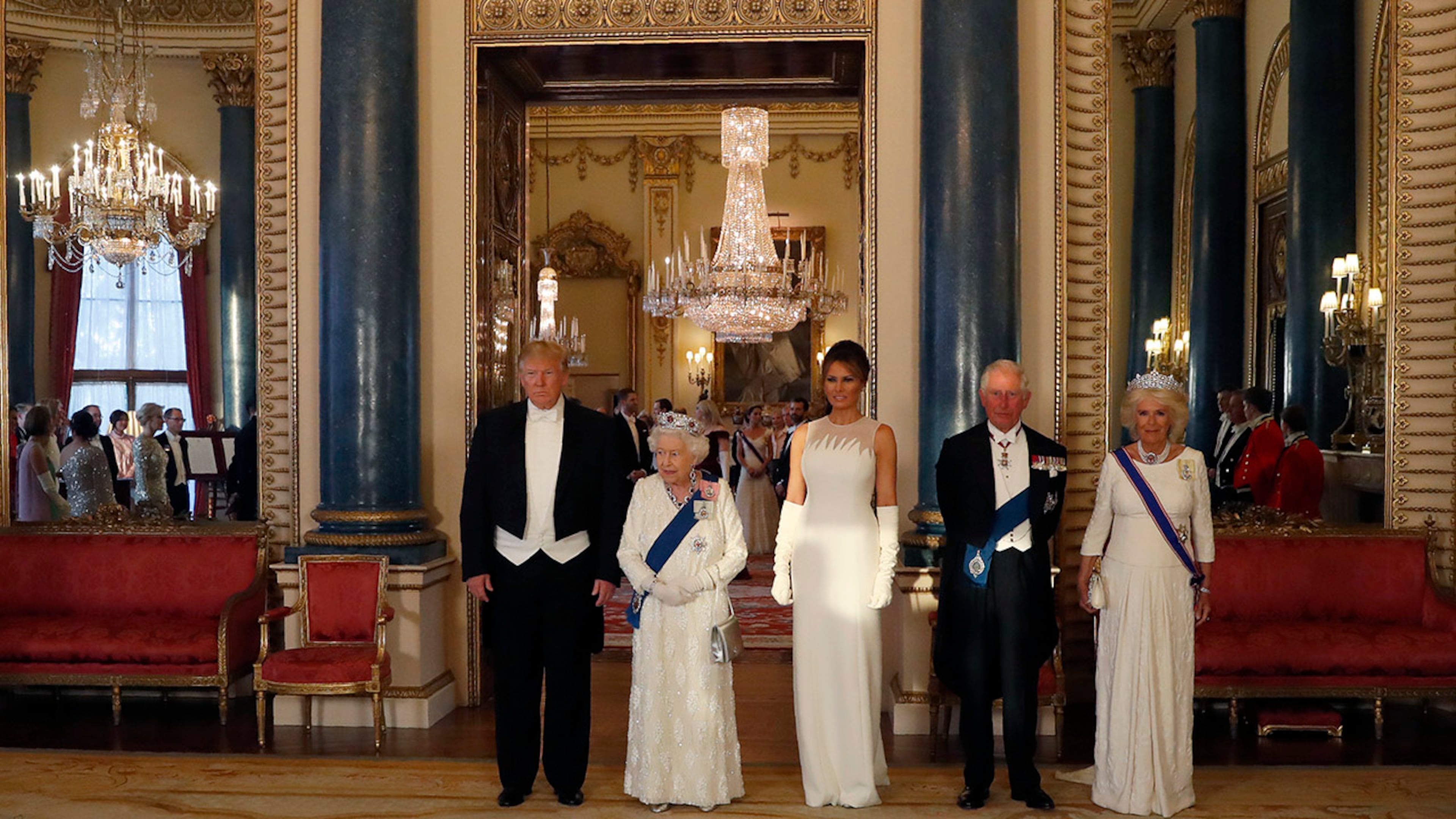 President Donald Trump, Britain's Queen Elizabeth II, first lady Melania Trump, Prince Charles and Camilla, the Duchess of Cornwall pose for the media ahead of the State Banquet at Buckingham Palace in London, Monday, June 3, 2019. Trump is on a three-day state visit to Britain.