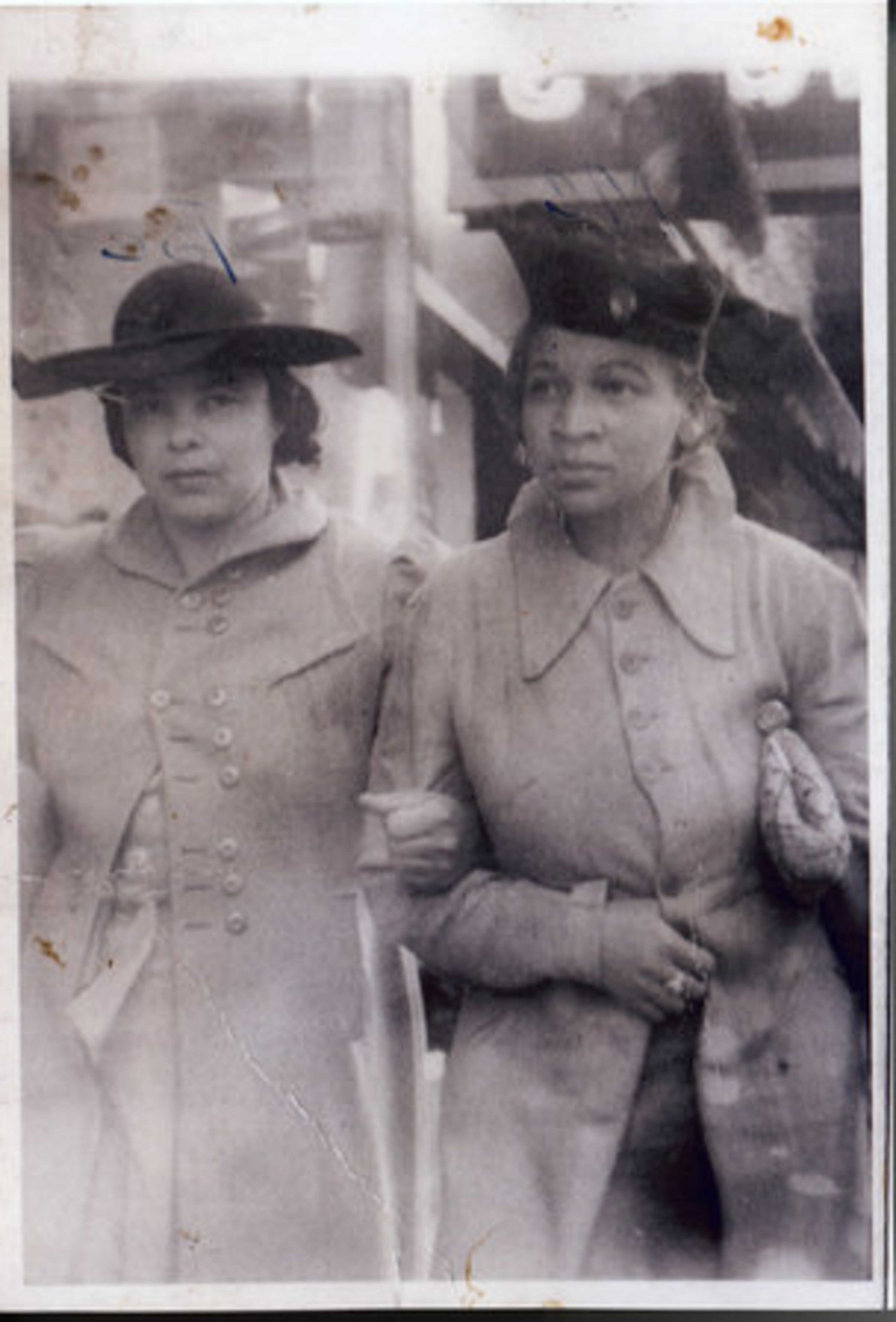 Glenn Hunter's mother, Maggie Woods (right), raised eight children by herself by working as a domestic in the Atlanta area. In 1972, she became Lithonia's first black councilwoman. Since then, three of her children have become leaders in the small southern DeKalb County city.