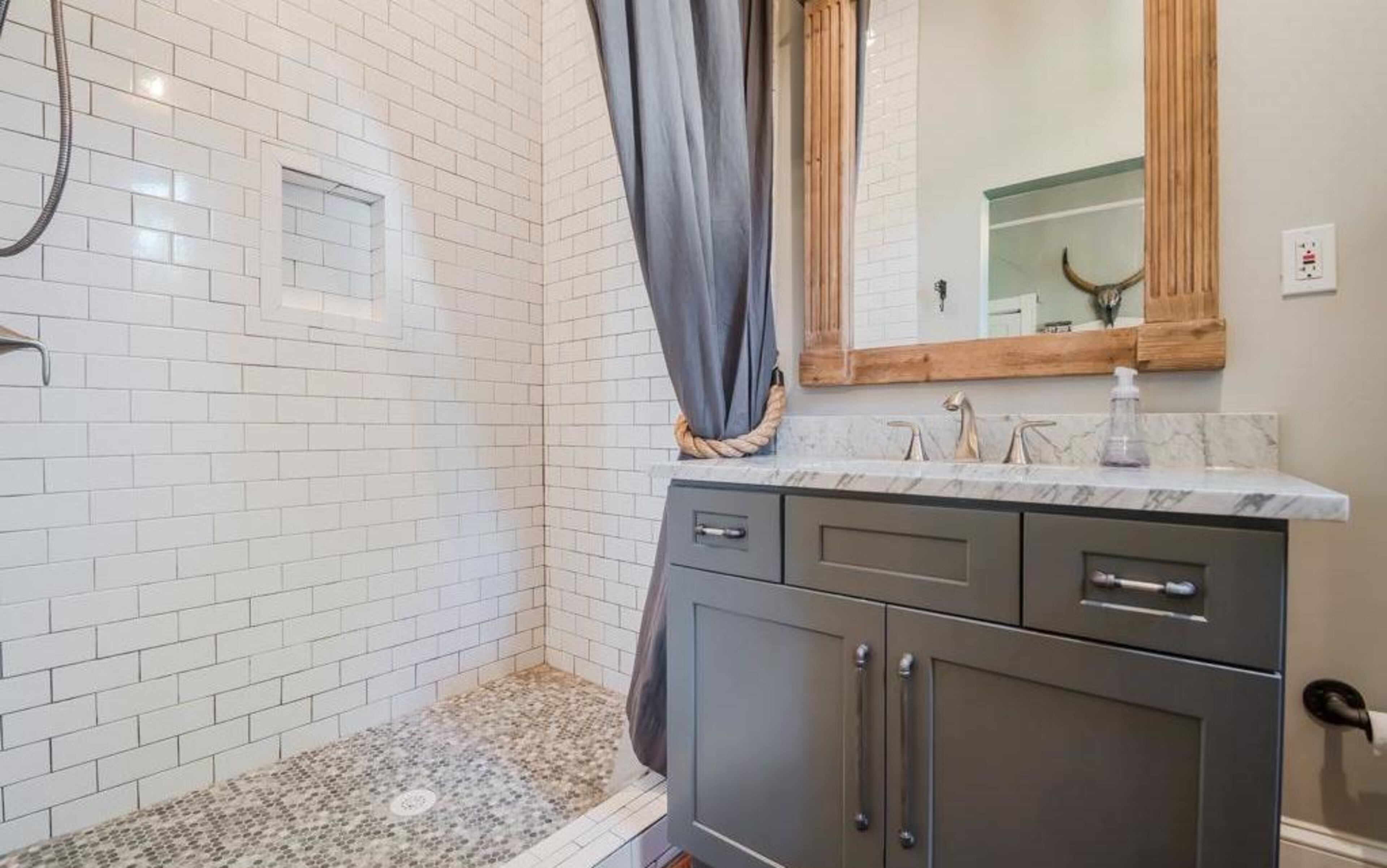 Josh and Joey fixed up the shower and added an improved sink and cabinet.