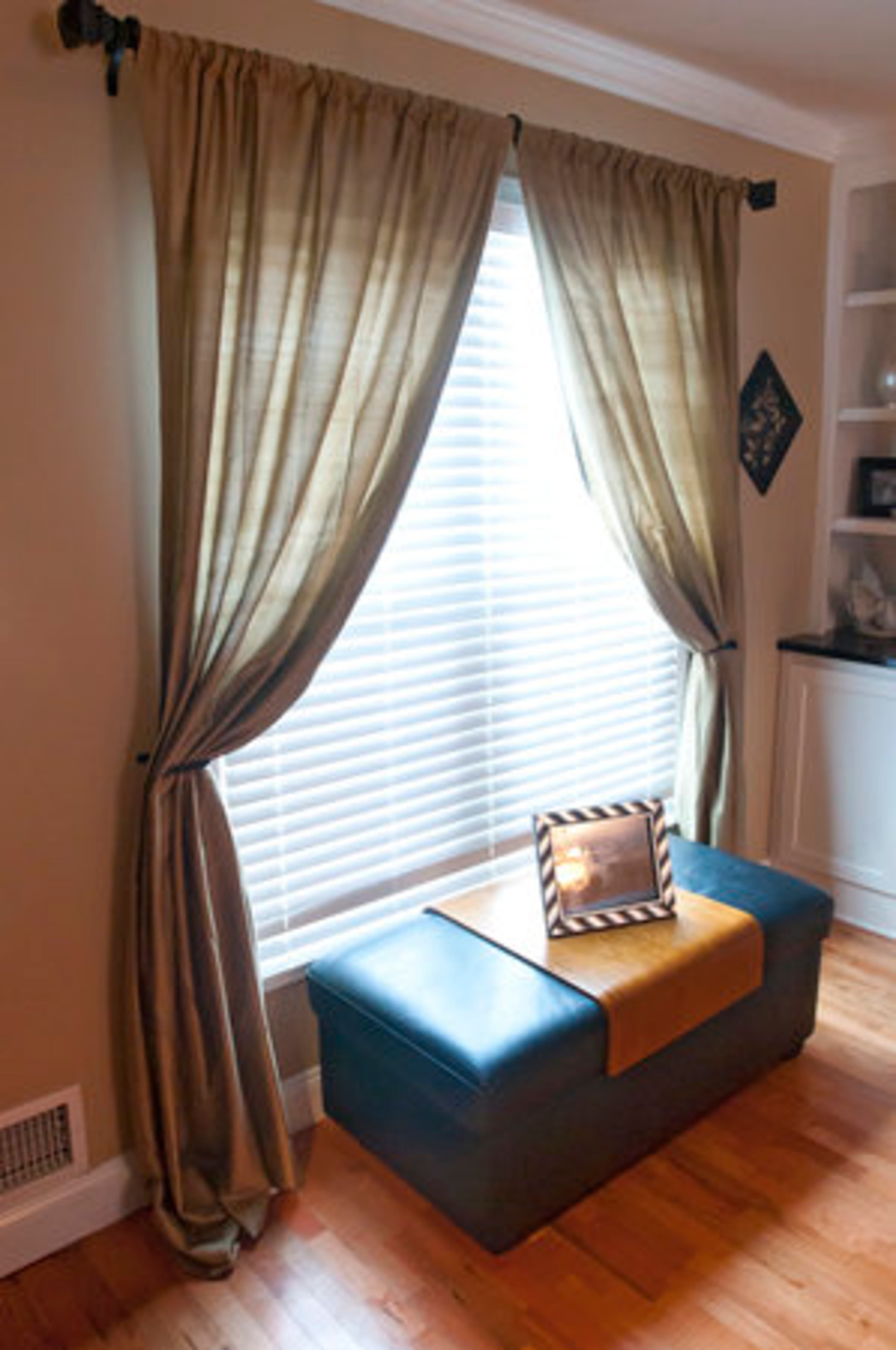 The custom-made drapes add a final finish to this room, Vanessa said. They are great at softening light coming into a room and enhancing existing colors as well.