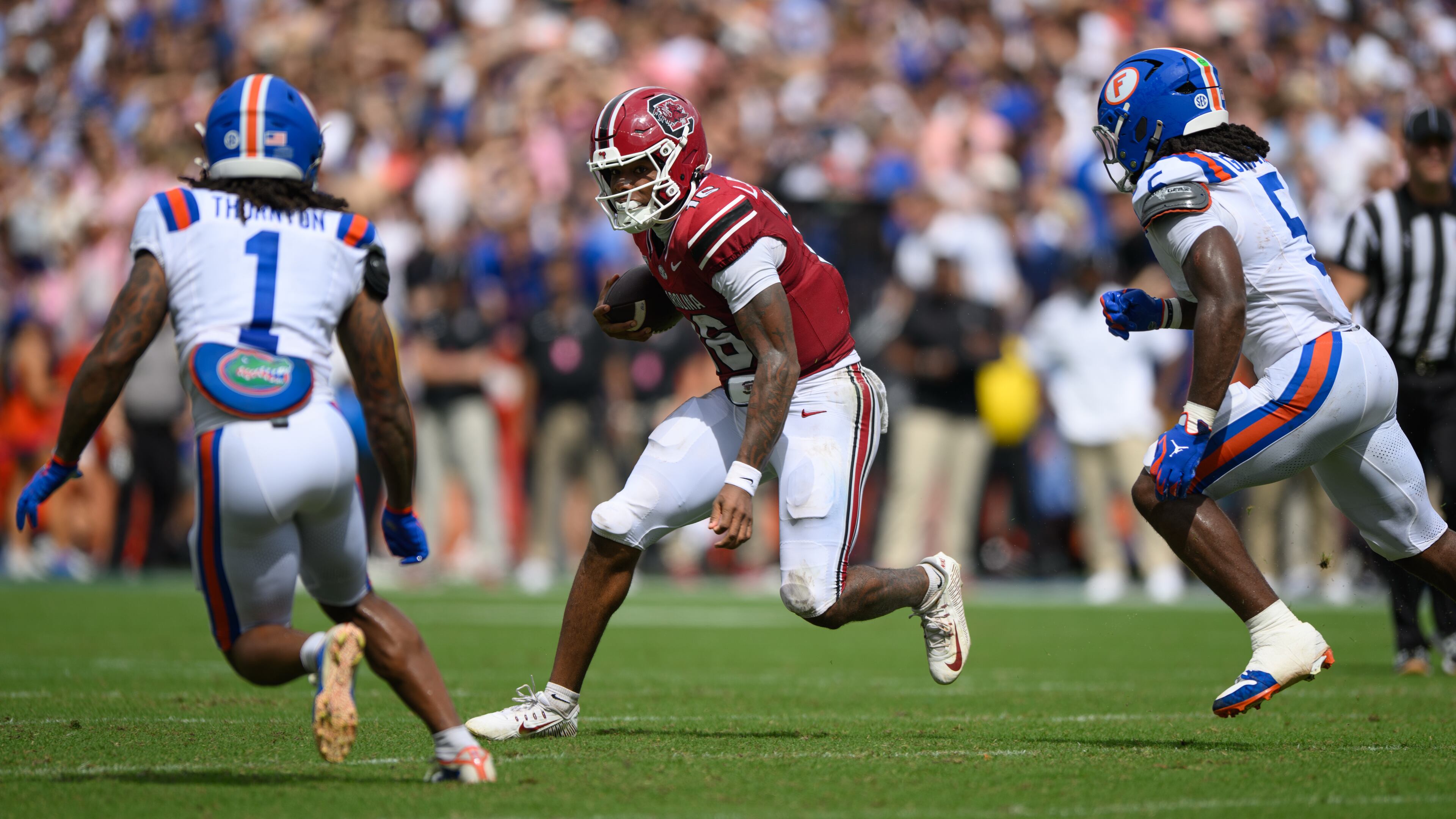 South Carolina quarterback LaNorris Sellers (16) rushes during the first half of an NCAA college football game against Florida, Saturday, Oct. 10, 2026, in Gainesville, Fla. (AP Photo/Noah Lantor)