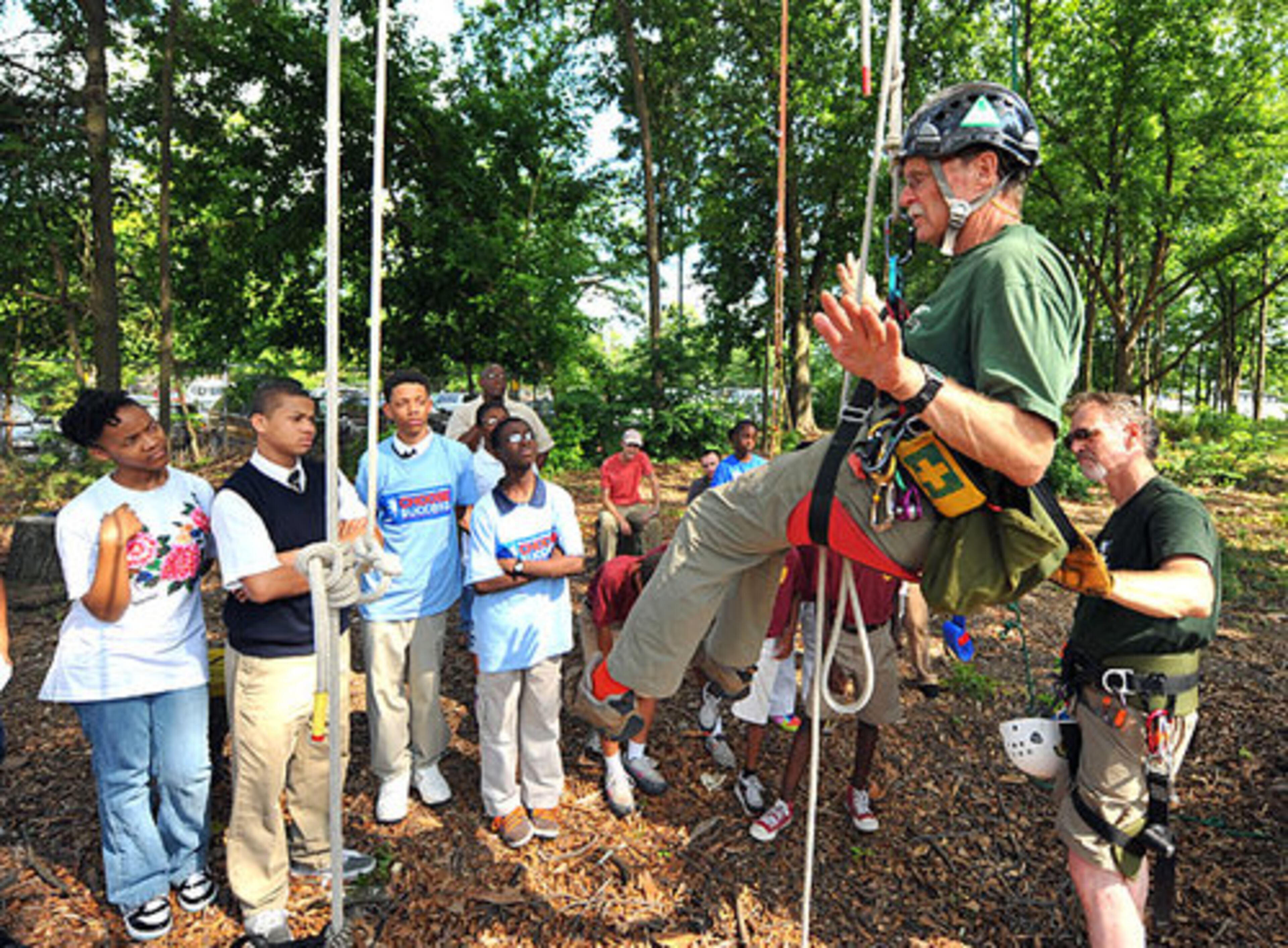 Peter Jenkins and Hank Blaustein show the middle school children the ropes.
