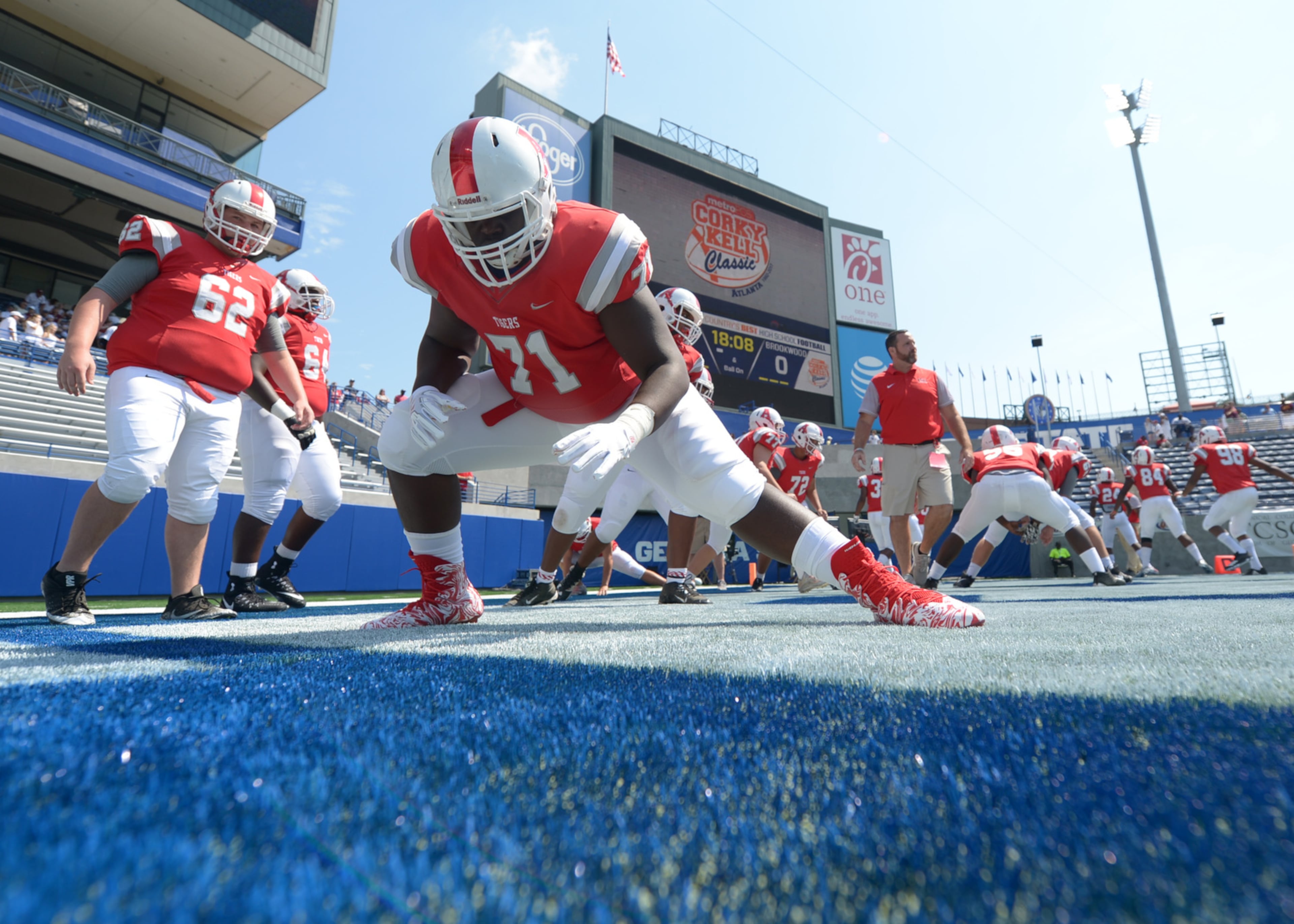 Archer sophomore OL Israel Mukwiza (71) stretches prior to his game against Brookwood in the Corky Kell Classic at Georgia State Stadium Saturday, August 19, 2017.