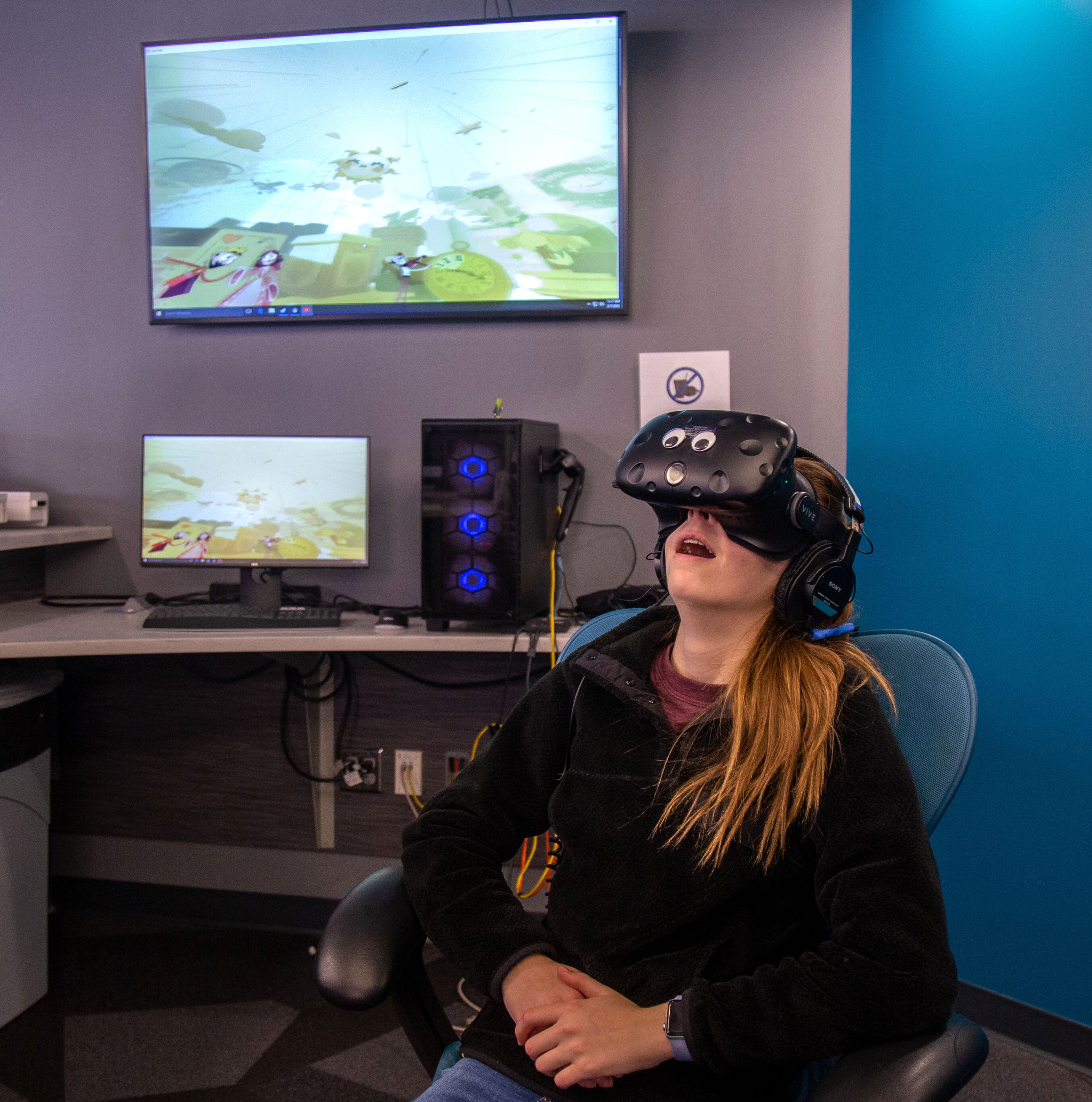 Paige Dunmire participates in a virtual reality demonstration during the Genius Camp in the ExLab at Georgia State University on Saturday, March 7, 2020. STEVE SCHAEFER / SPECIAL TO THE AJC