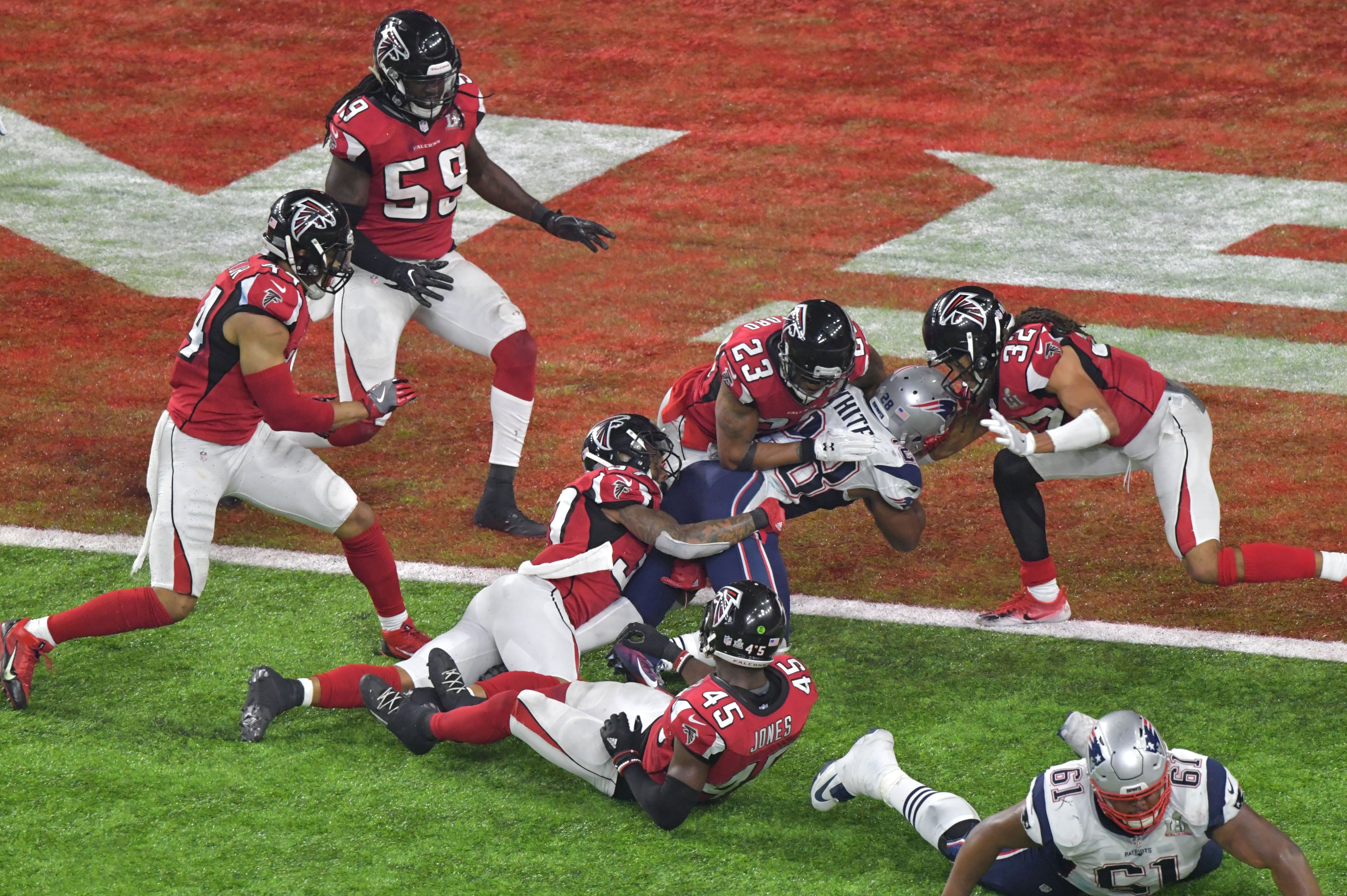 No. 2 -- James White's TD: Patriots running back James White dives in for the winning touchdown in overtime. (Hyosub Shin/hshin@ajc.com)