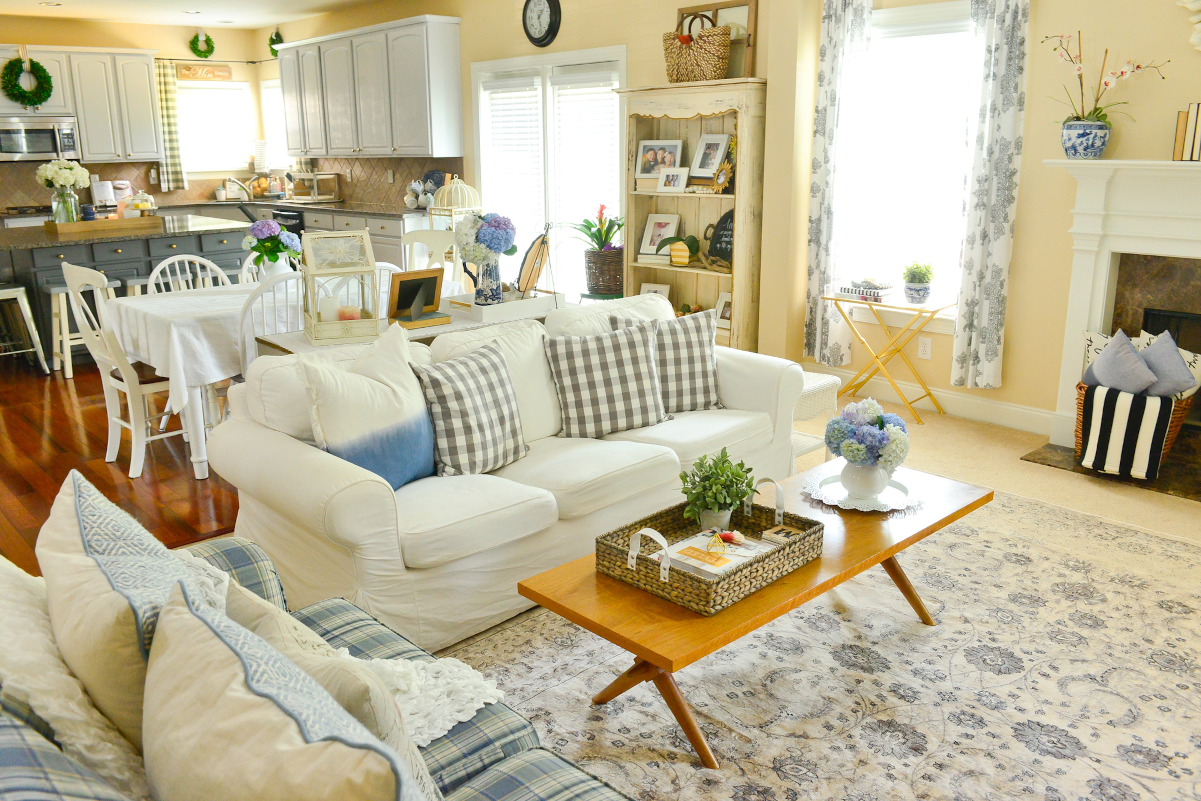 The open kitchen/family room floor plan is one of the family's favorite aspects of their Cumming house, says homeowner Yuni Min. Because the kitchen island is a great place to congregate, having the kitchen open to the family room where they read, play and watch TV makes spending time together easier.