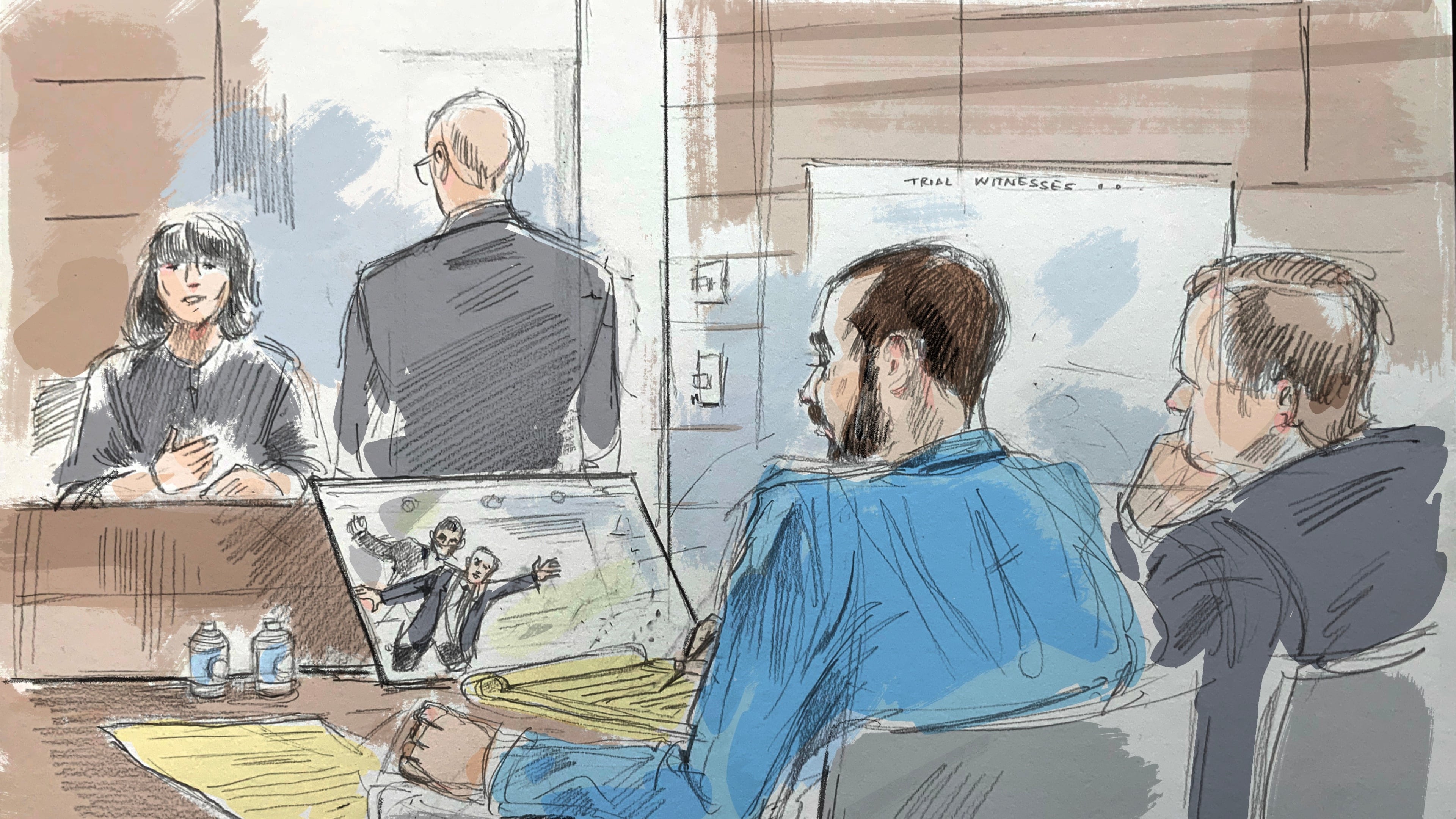 In this courtroom sketch, a witness describes video of an alleged attack on Salman Rushdie by Hadi Matar, in federal court in Buffalo, N.Y., Wednesday, July 22, 2026. Matar, foreground, is seated with his lawyer's co-council. (Alexandra Newbould via AP)