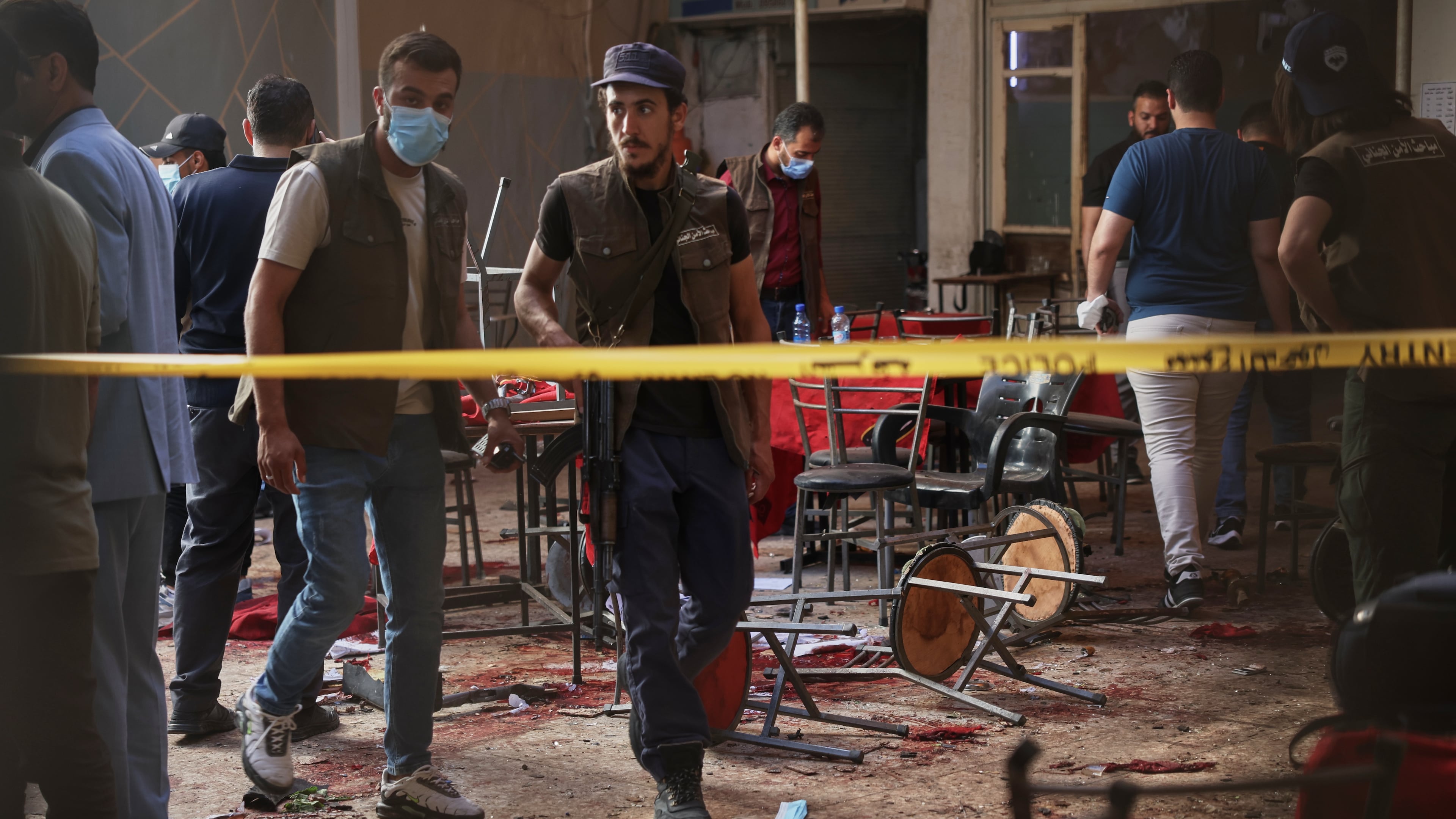 Syrian security inspects the site after an explosive device was detonated in a cafe near the main courthouse complex, in Damascus, Syria, Thursday, July 2, 2026 (AP Photo/Ghaith Alsayed)