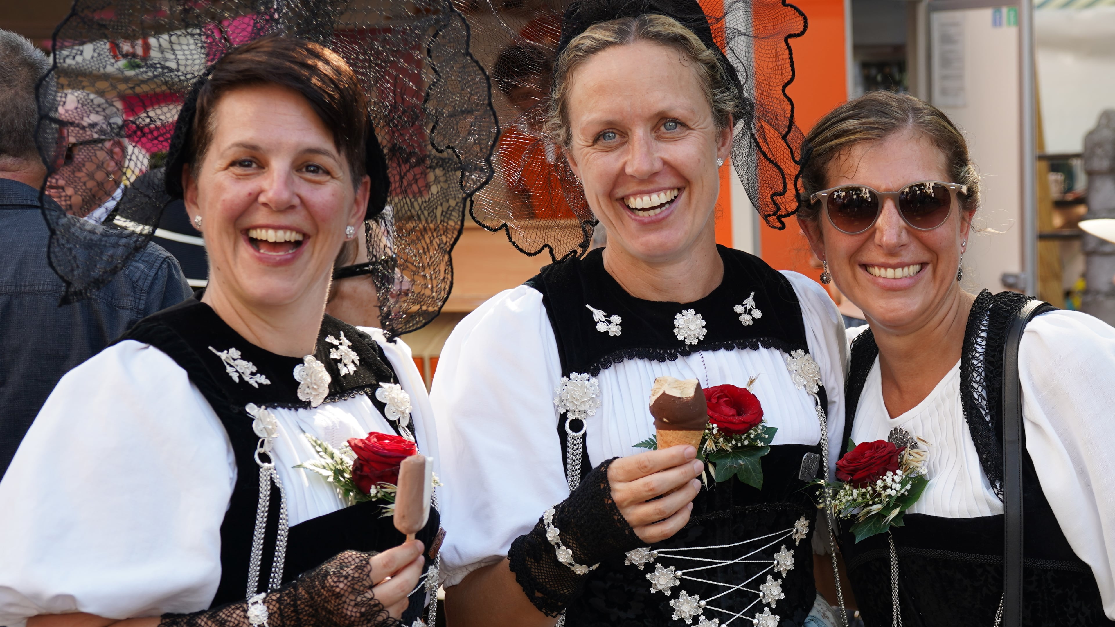 Yodeling women wear traditional clothes as they pose in Basel, Switzerland, Saturday, June 27, 2026. (AP Photo/Jez Fielder)
