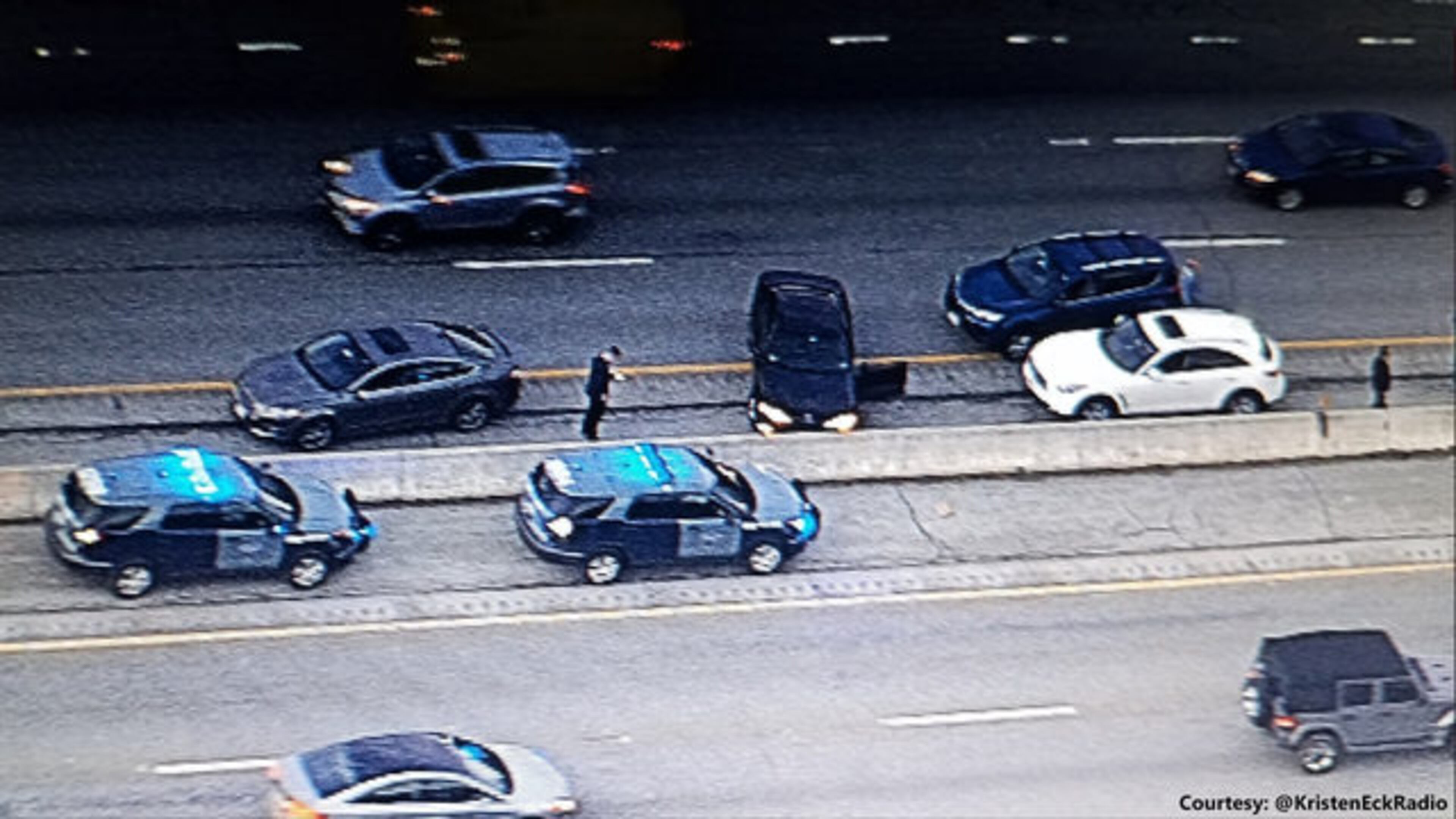 A 65-year-old man held onto the hood of an SUV for nearly three miles after a confrontation with the driver who had caused an accident. (Photo courtesy @KristenEckRadio)