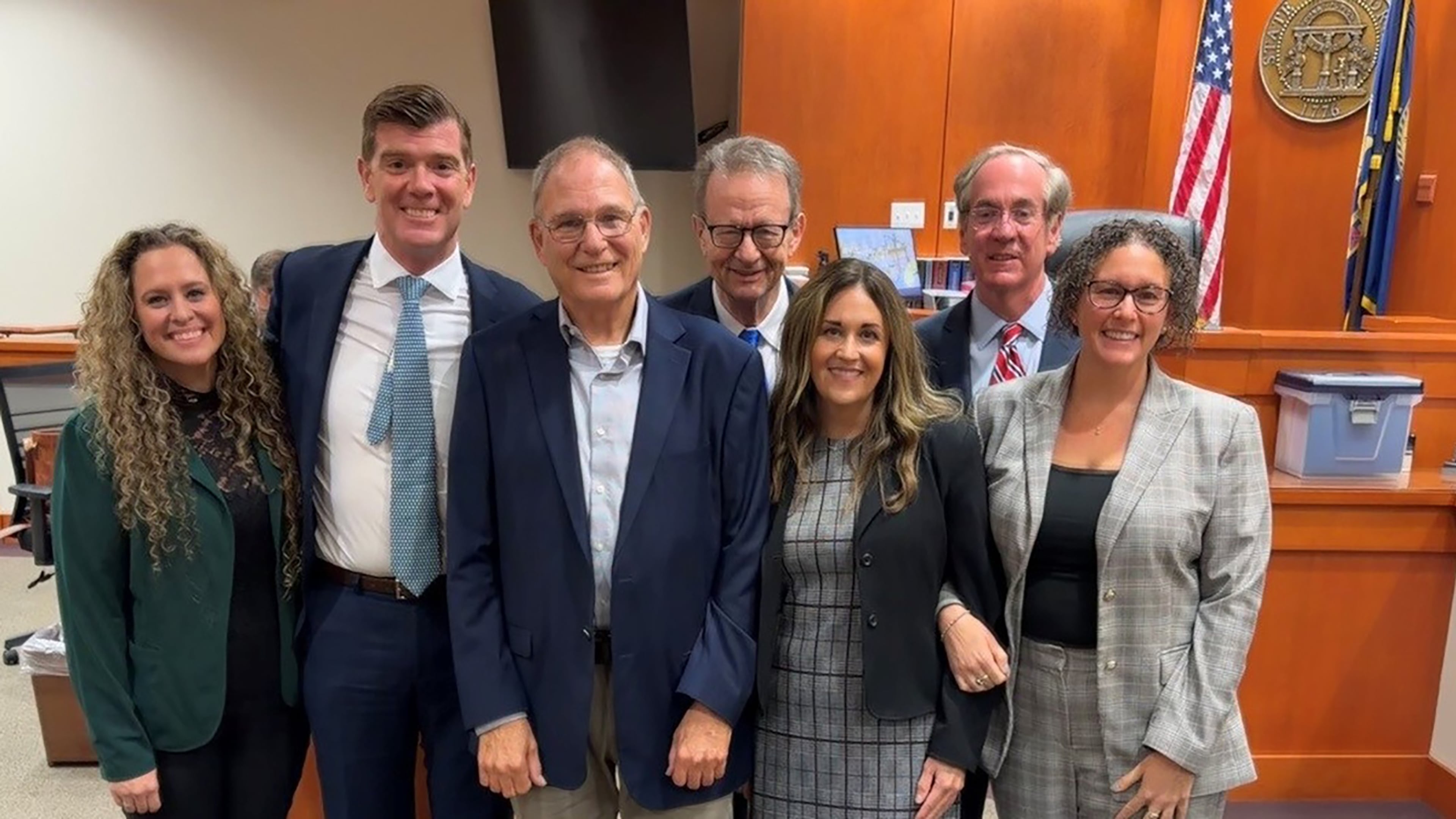 Georgia man Greg Lassiter (third from left), pictured with his lawyers, won $5 million at trial in DeKalb County this month against Yamaha and Honda. Lassiter alleged his aggressive cancer was caused by his exposure to asbestos while working on Yamaha and Honda motorcycles that he raced for decades. (Courtesy of Simmons Hanly Conroy)