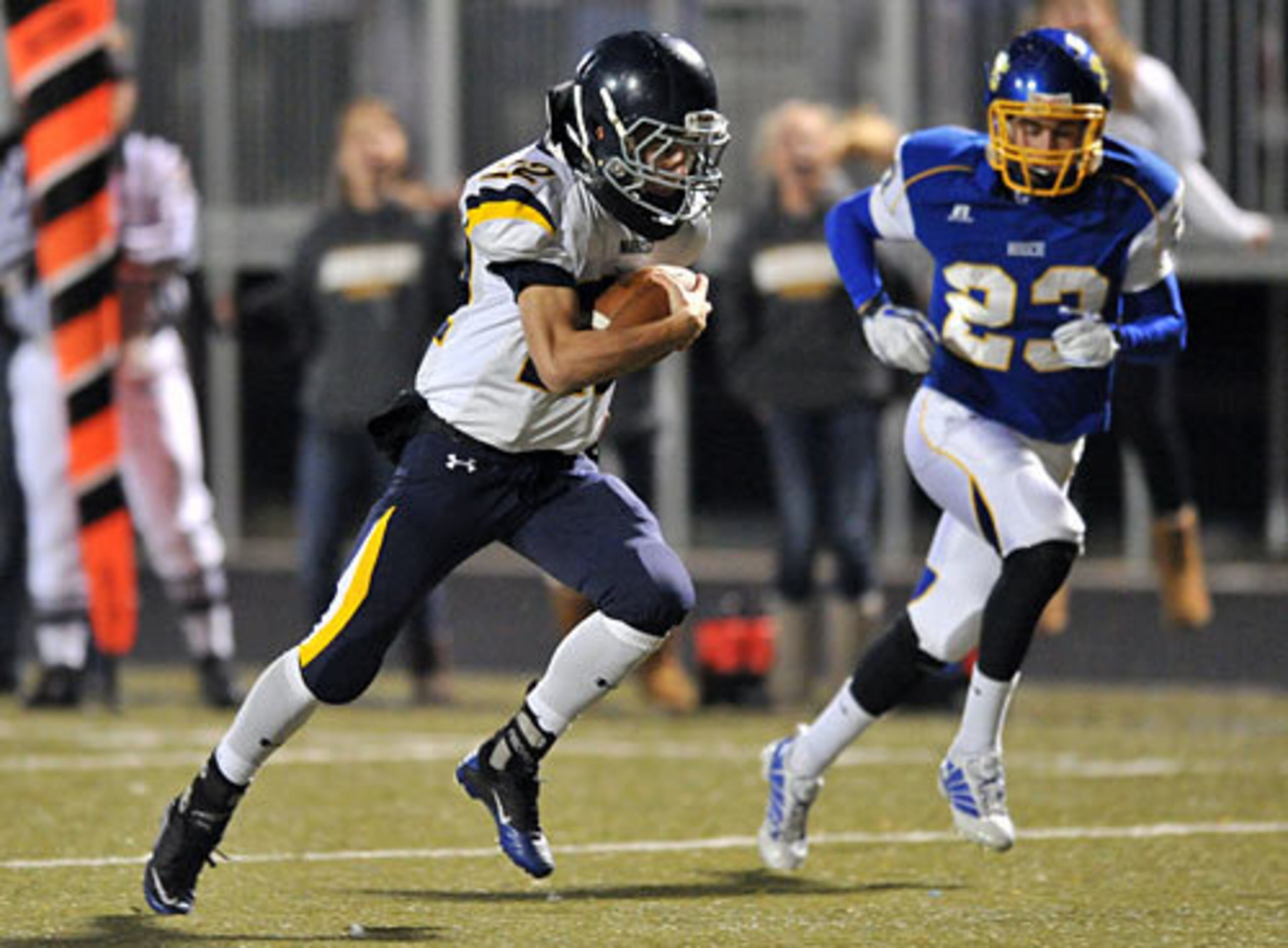 Marist's Gray King runs for a touchdown in the first half against Chattahoochee.