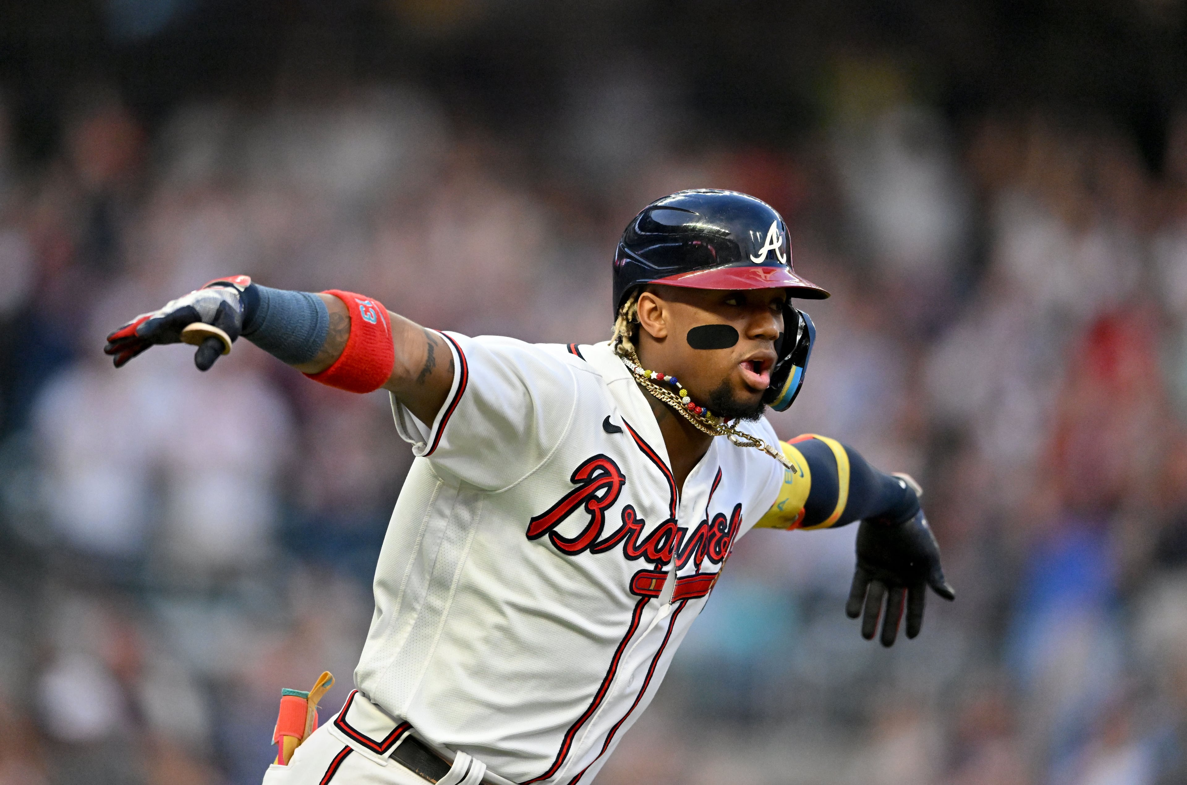 Atlanta Braves' right fielder Ronald Acuna Jr. (13) celebrates after hitting a solo home run during the first inning at Truist Park, Tuesday, September 19, 2023, in Atlanta. (Hyosub Shin / Hyosub.Shin@ajc.com)