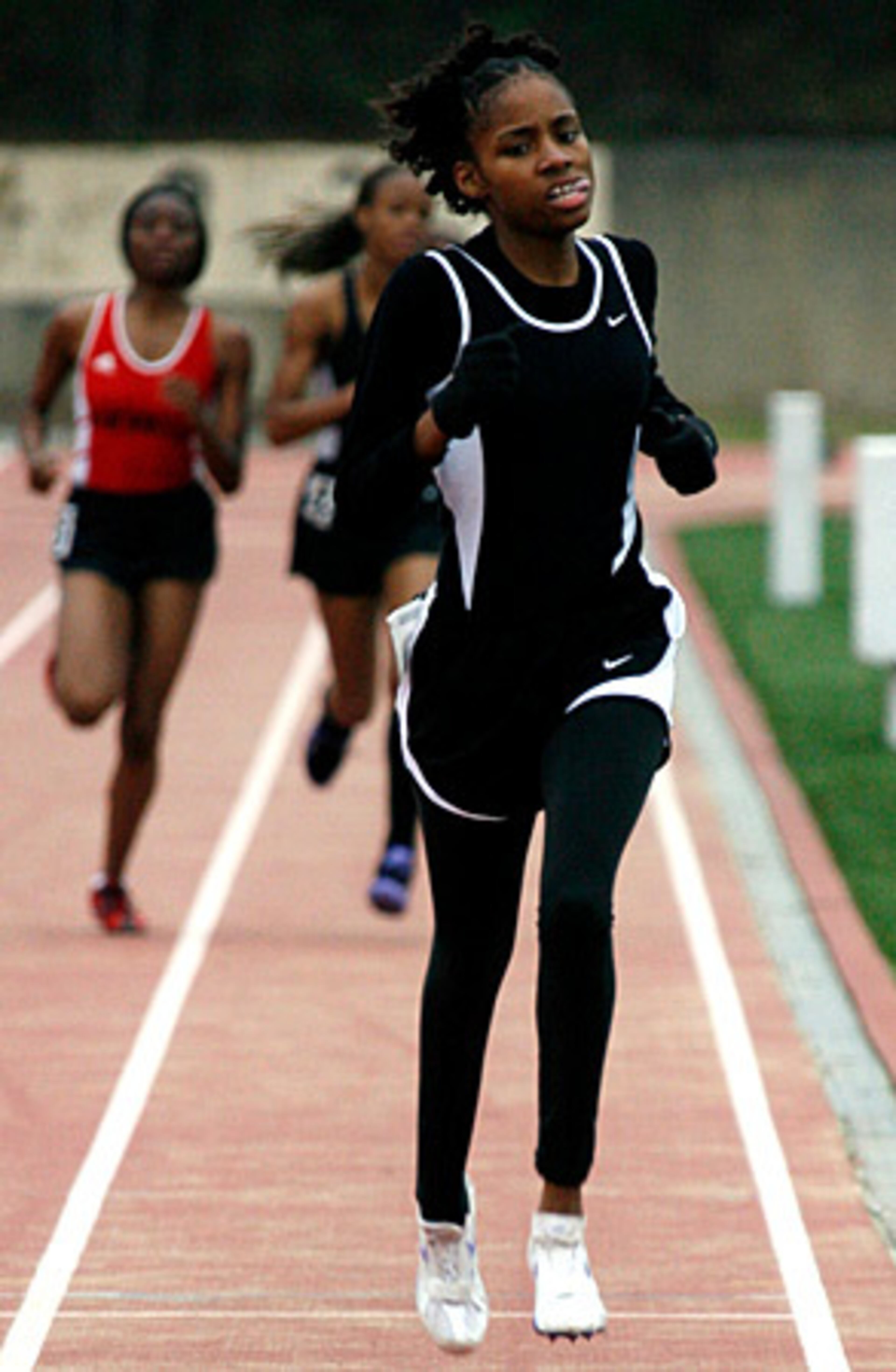 North Atlanta's Jovelle Patterson battles it out down the homestretch to finish first in the Girls' 800 Meters.