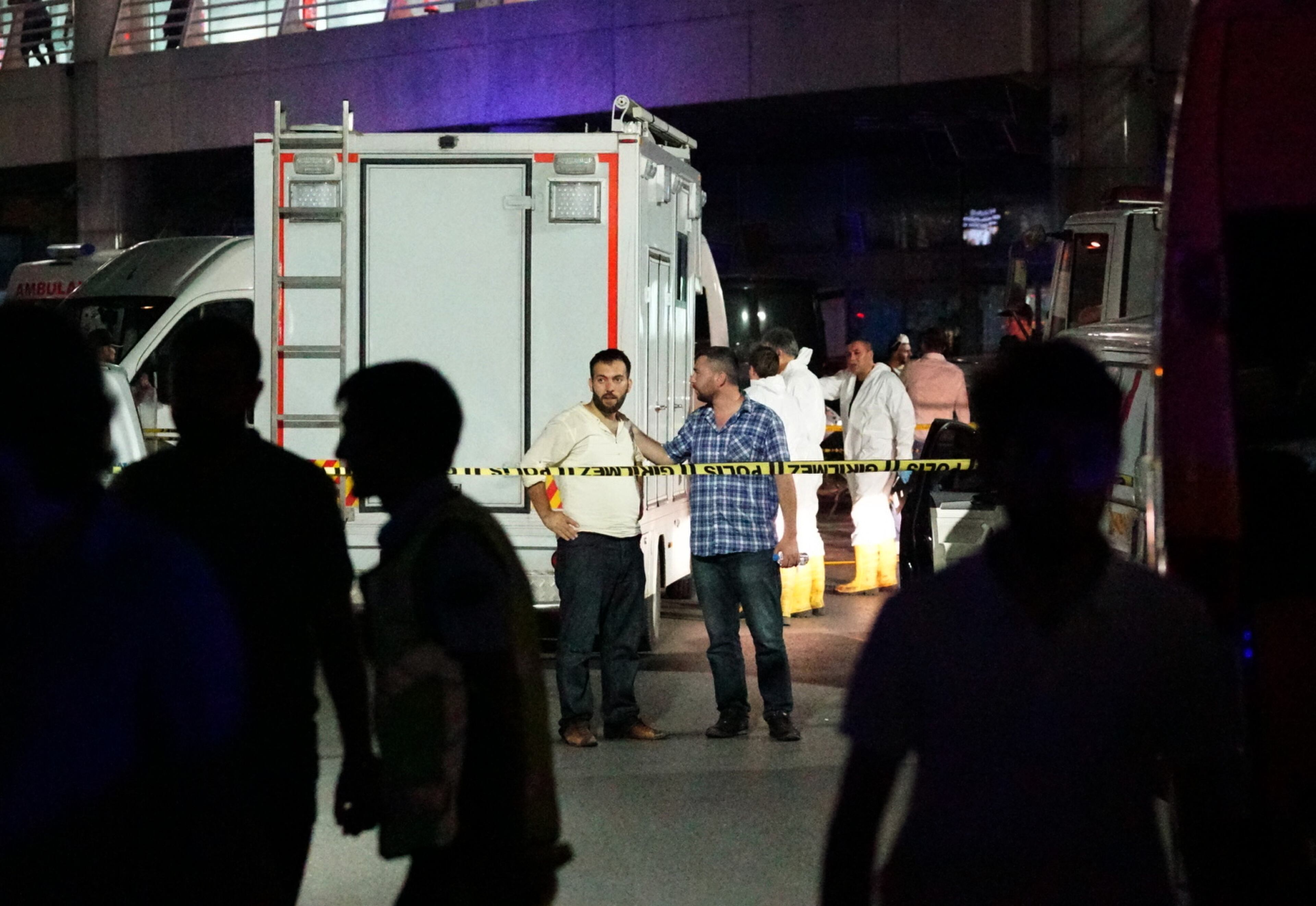 Turkish security officers gather outside Turkey's largest airport, Istanbul Ataturk, on June 28, 2016 in Istanbul, Turkey. Three suicide bombers opened fire before blowing themselves up at the entrance to the main international airport in Istanbul, killing at least 28 people and wounding at least 60 people, according to Istanbul governor Vasip Sahin. (Photo by Mehmet Ali Poyraz/Getty Images)