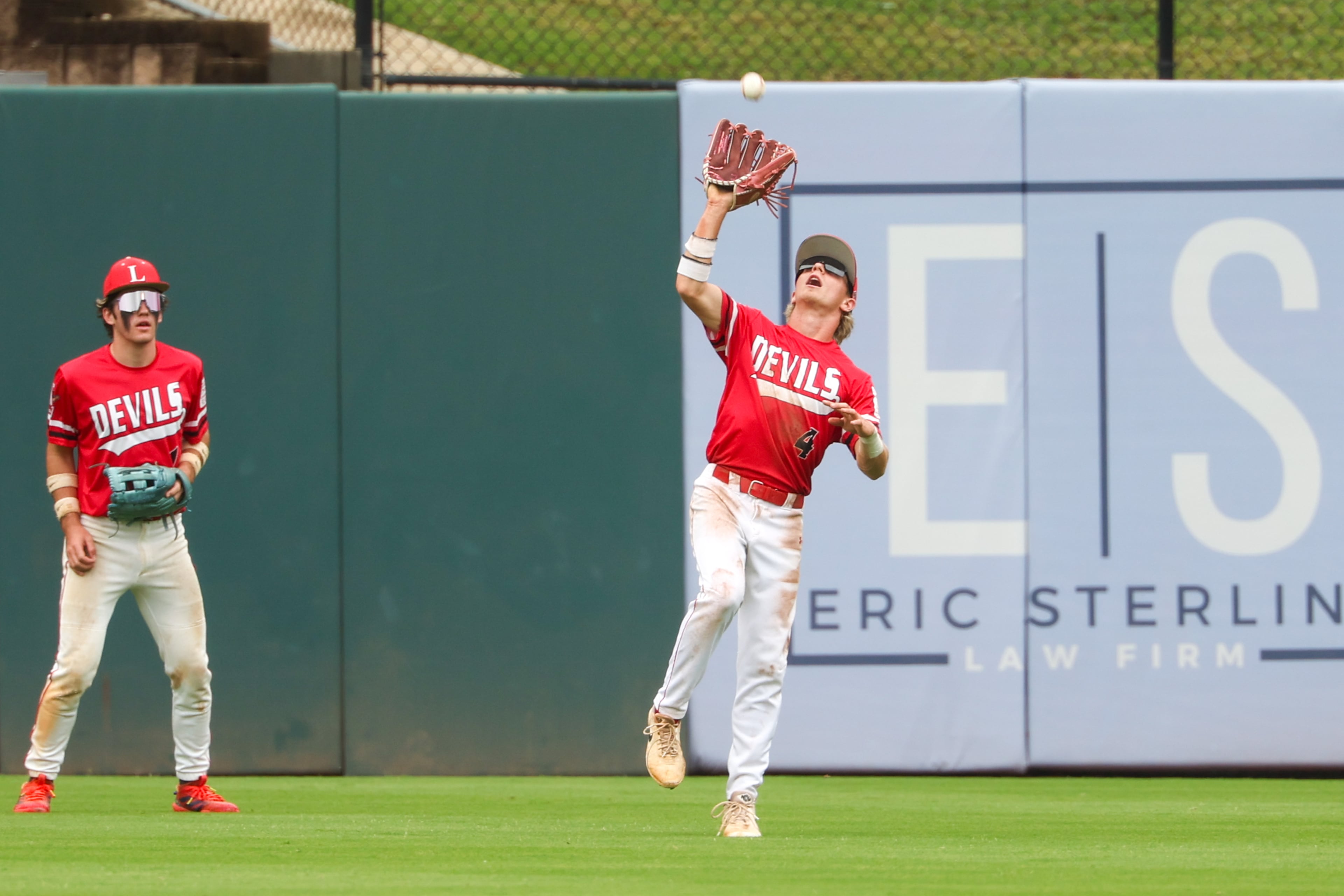 Loganville’s Aiden Gorvett makes an out during the second inning in Game 2 of their GHSA Class 5A baseball championship series against Pope at Gwinnett Field on Tuesday, May 26, 2026, in Lawrenceville. (Arvin Temkar/AJC)