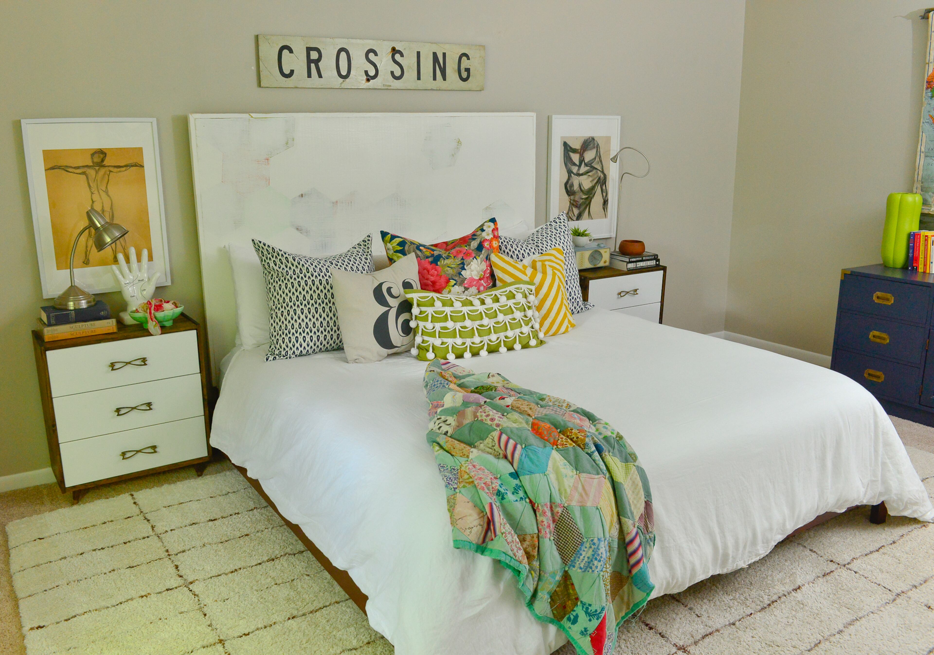 Master bedroom: The master bedroom shows off homeowner and DIYer Dena Stormer's eclectic style. She created the headboard and pillow. She also redid the Ikea side tables to bring mid-century style to the room.