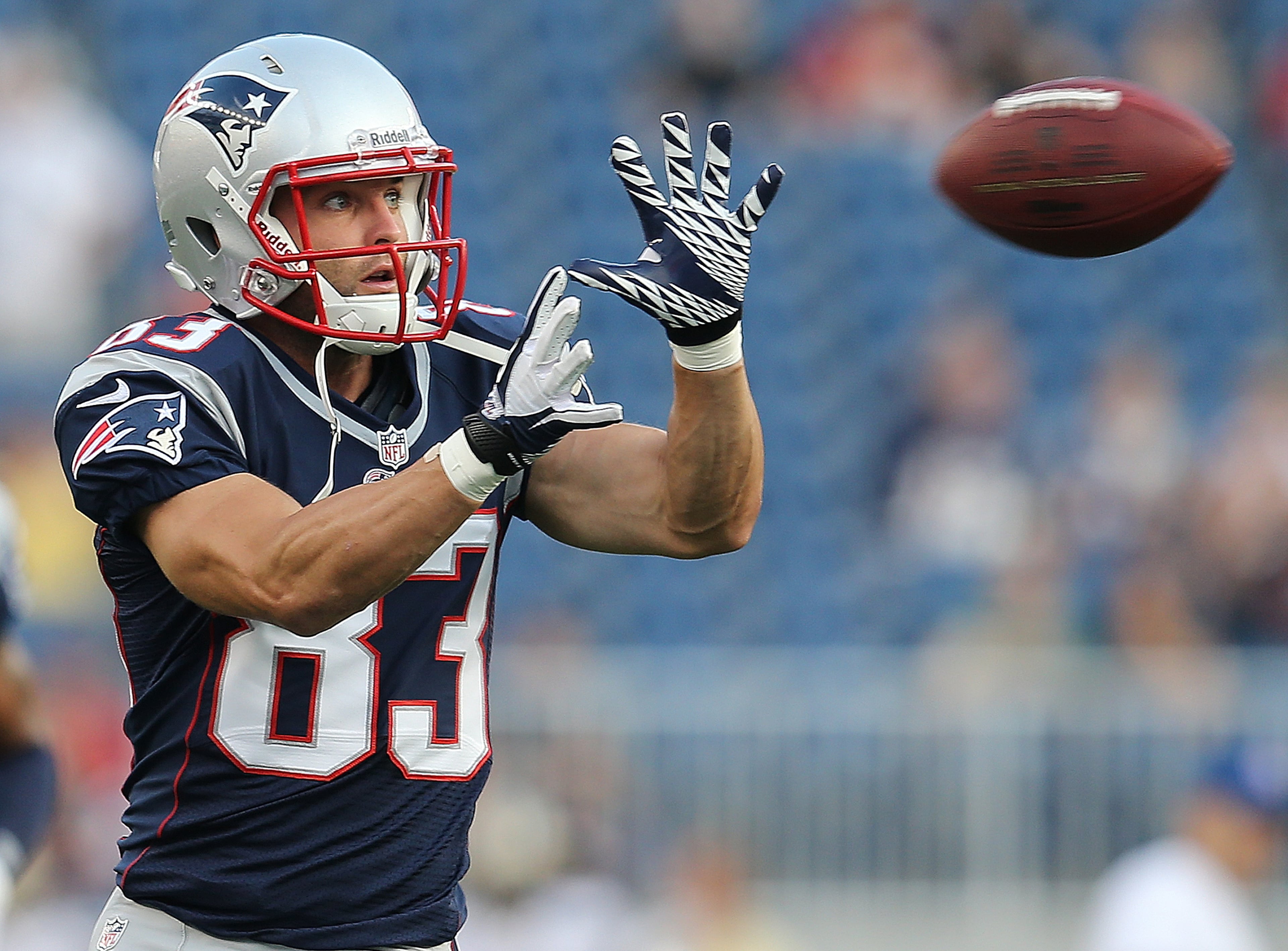 Wes Welker of the New England Patriots catches a pass before a preseason game with New Orleans Saints at Gillette Stadium on Aug. 9, 2012, in Foxboro, Mass.