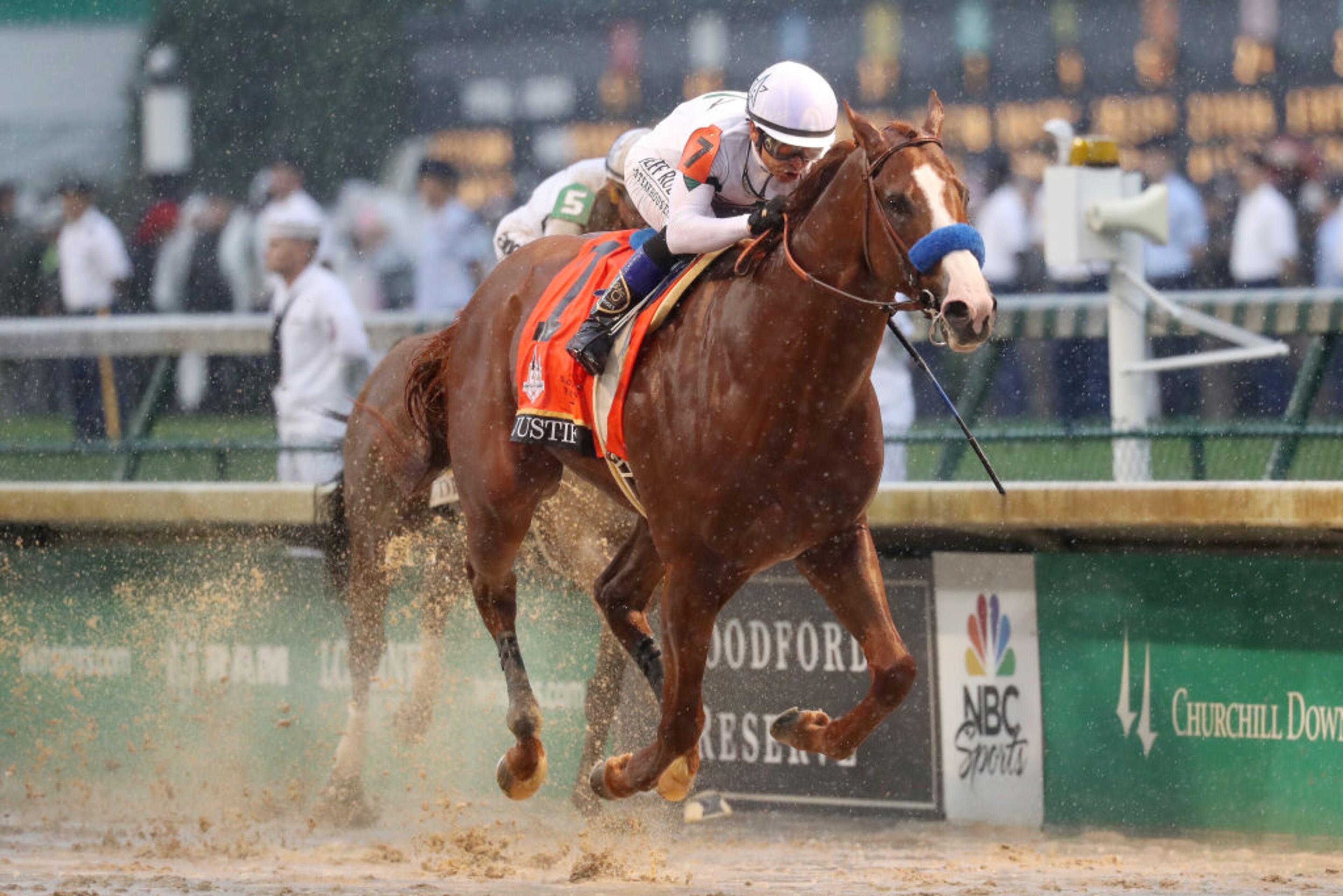 LOUISVILLE, KY - MAY 05: Justify #7, ridden by jockey Mike Smith crosses the finish line to win the 144th running of the Kentucky Derby at Churchill Downs on May 5, 2018 in Louisville, Kentucky. (Photo by Rob Carr/Getty Images)