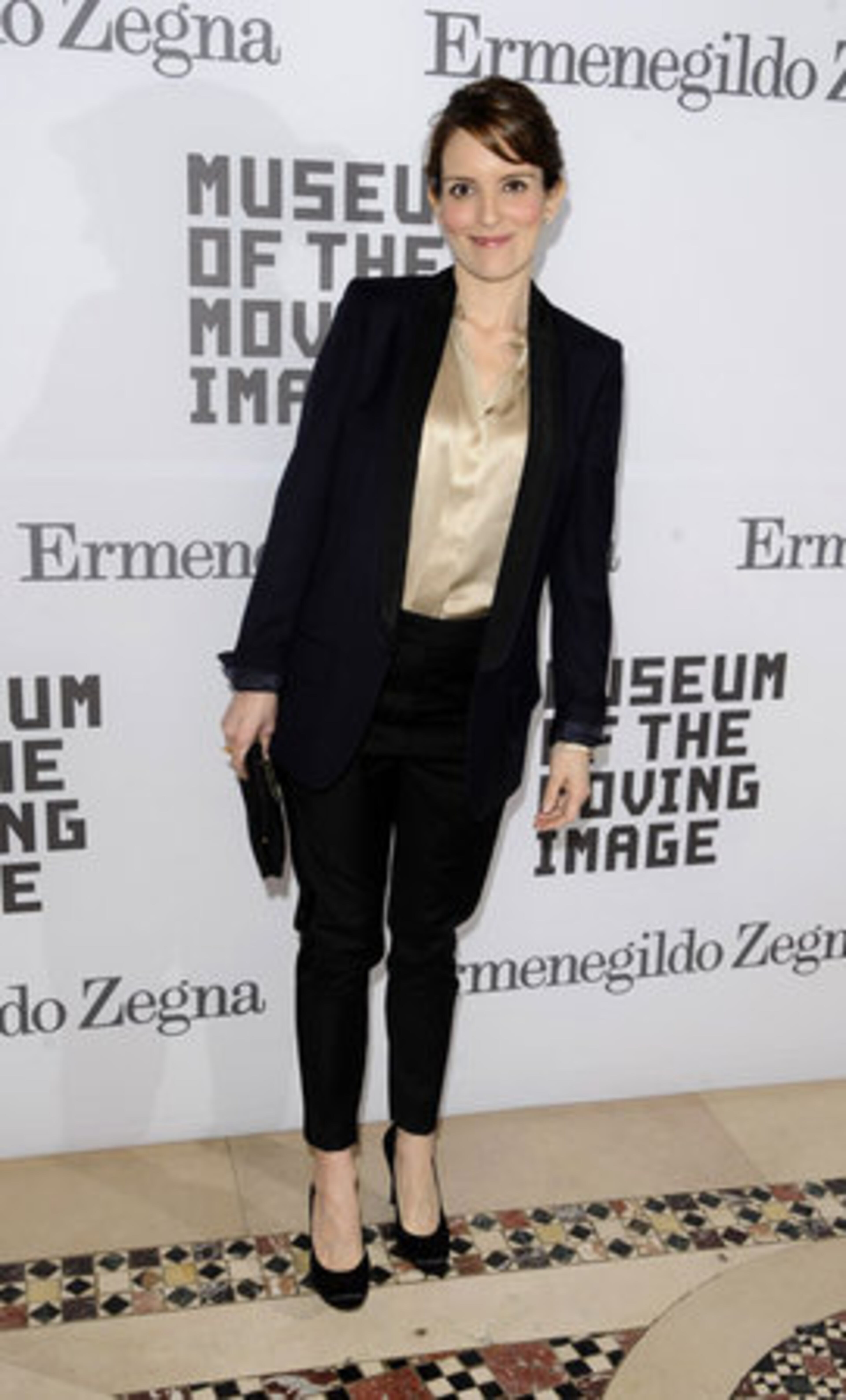 Baldwin's on-screen right-hand woman Tina Fey poses for a photo.